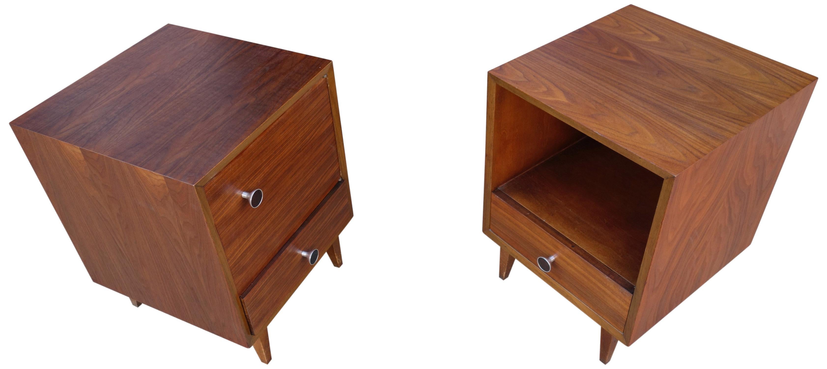 Midcentury nightstands, bedside tables, or end tables by George Nelson for Herman Miller. Highly figured walnut almost has a rosewood appearance. Featuring the seldom seen pulls with ebony inlay. 

-Photos taken with natural light on a sunny day.