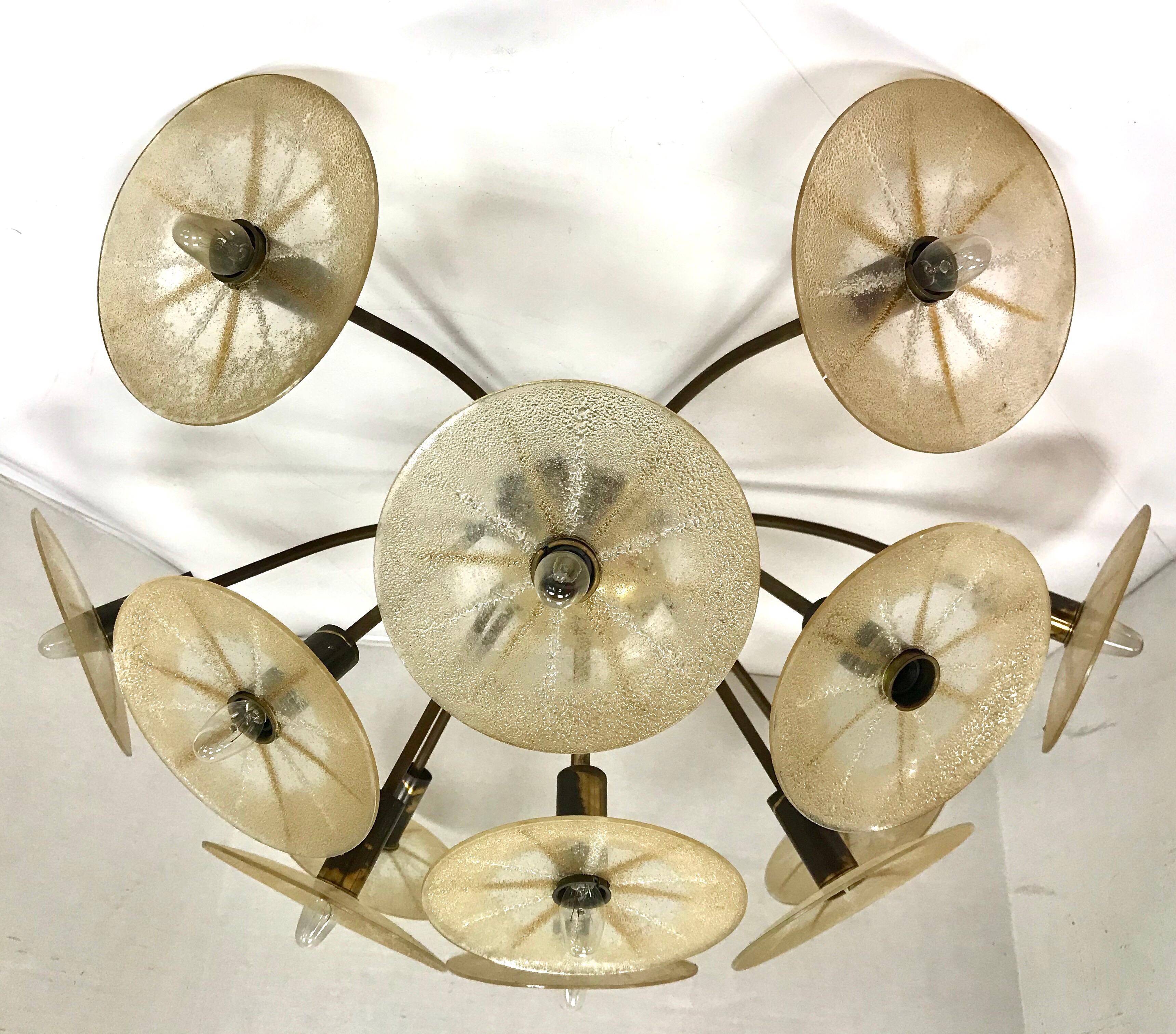 Very unusual Mid-Century Modern chandelier manufactured by Lightolier and designed by Gerald Thurston. Manufacturer hallmark are inside cap and the chandelier is wired for USA. I holds 13 lights and is a flush mount. Everything is in working order