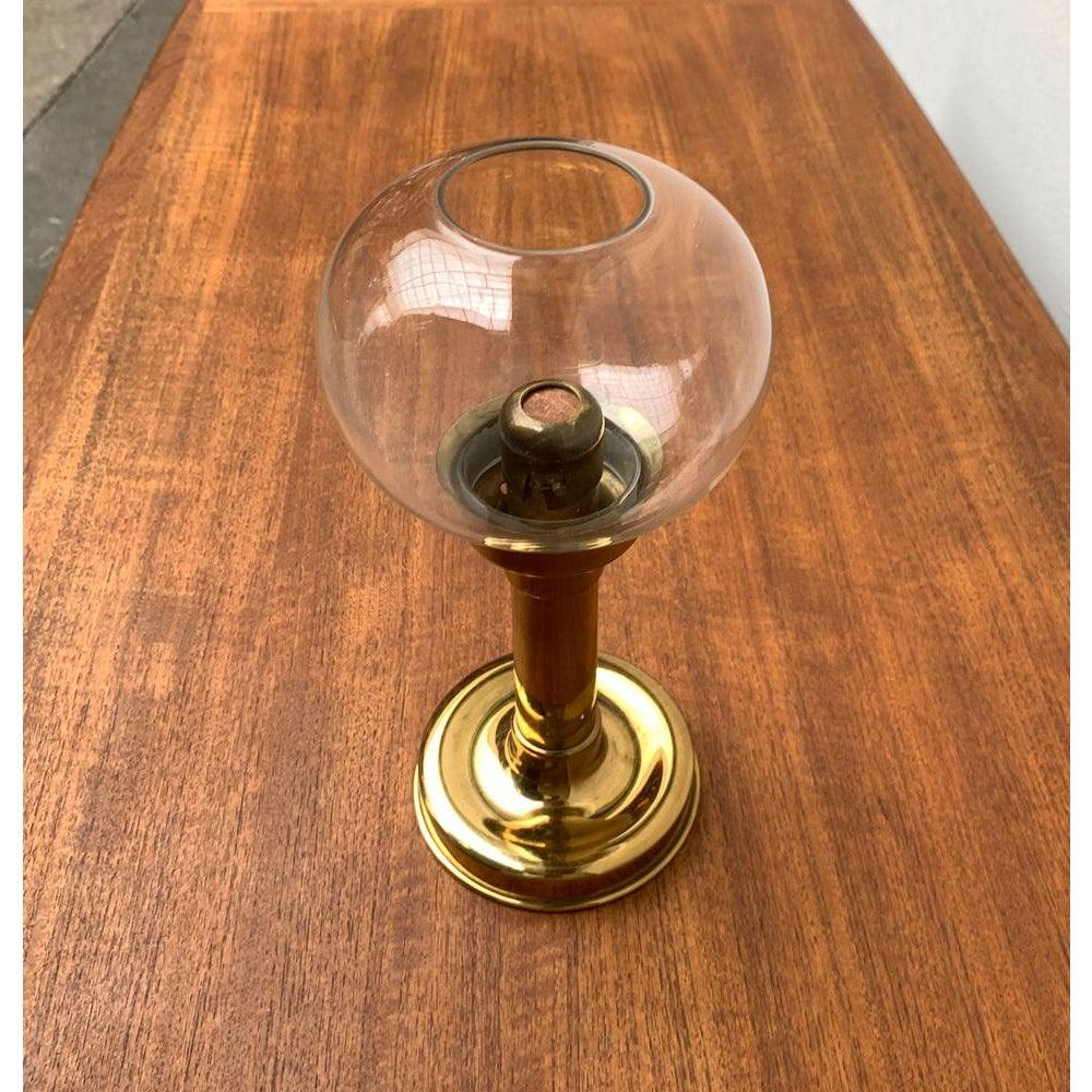 Mid-Century German Brass and Glass Candleholder by Harald Buchrucker, 1960s, in Very Good conditions. Designed 1960 to 1969 This piece has an attribution mark.

Additional information:
Materials: Glass, Metal
Style: Bauhaus, Mid-Century