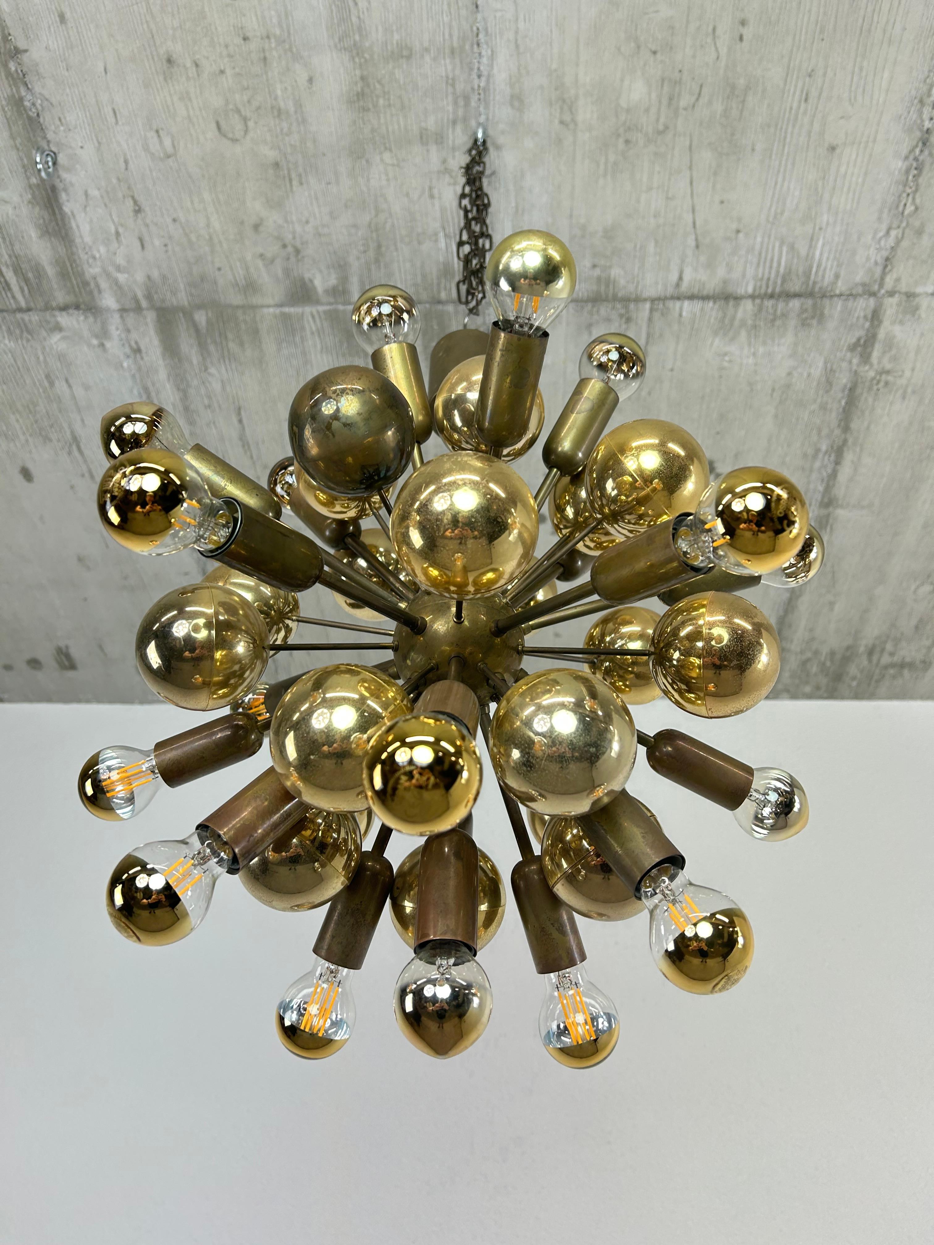 Mid-Century German brass Atomic ceiling pendant lamp by Dorothee Becker for Cosack in very nice original condition. 
