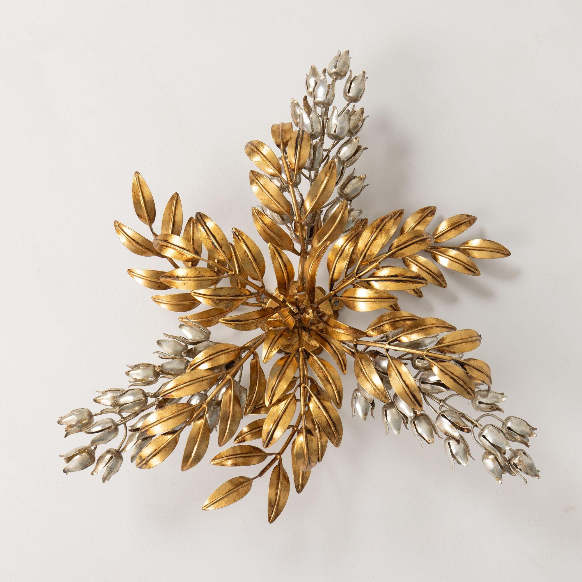 Rare Hollywood Regency style three-arm ‘Pioggia d’Oro’ (Golden Rain) ceiling light or wall sconce attributed to Hans Kögl, Germany, circa 1970. Featuring metal leaves coated with gold leaf and metal blooms coated with silver leaf. Hans Kögl’s