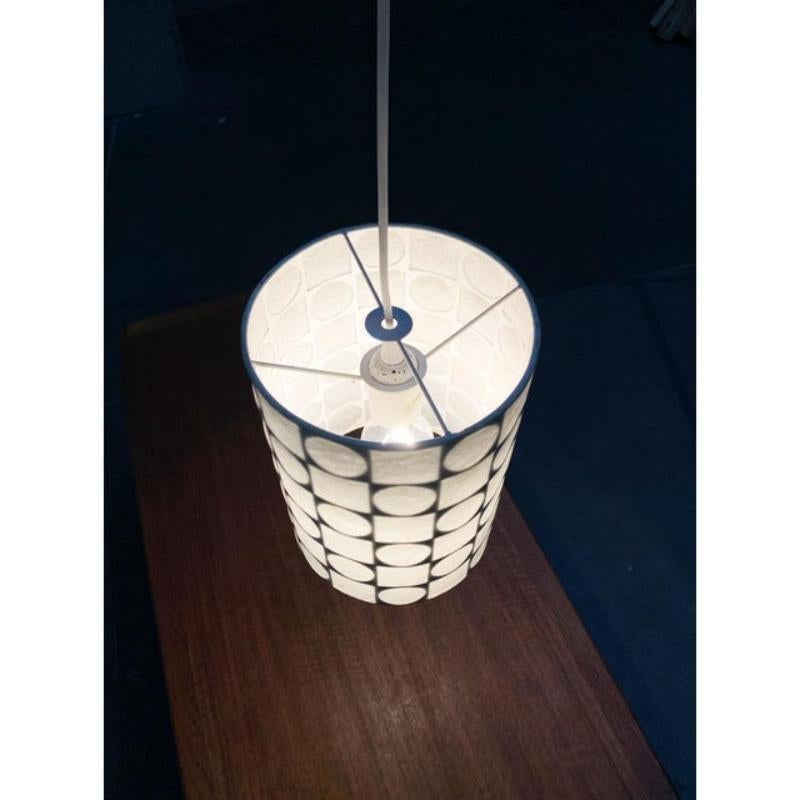 Rare mid-century cocoon pendant light from goldkant after a design by friedel wauer from the 1960s.

A minimalist design with a characteristic umbrella pattern. The lamp shows a simple cylinder shape. The actually special is the graphic pattern of