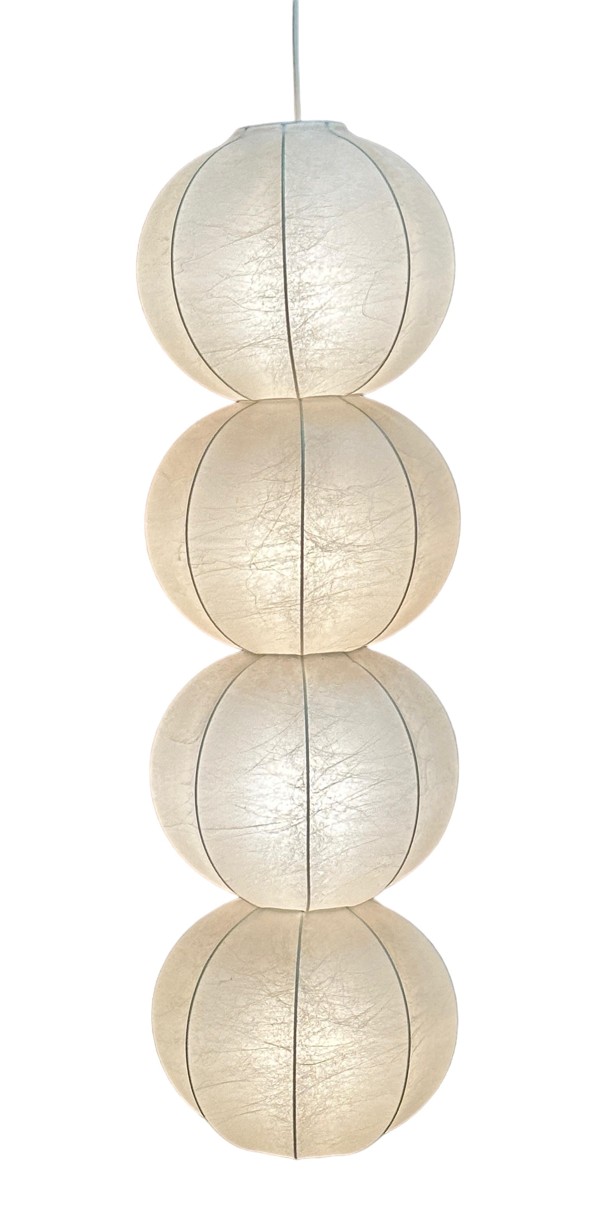 A beautifully Cocoon pendant light, by Friedel Wauer for Goldkant Leuchten, Germany. Comes fout of the Achille Castiglioni Era. Lampshades in very good vintage condition. Pendant with canopy is approx. 118