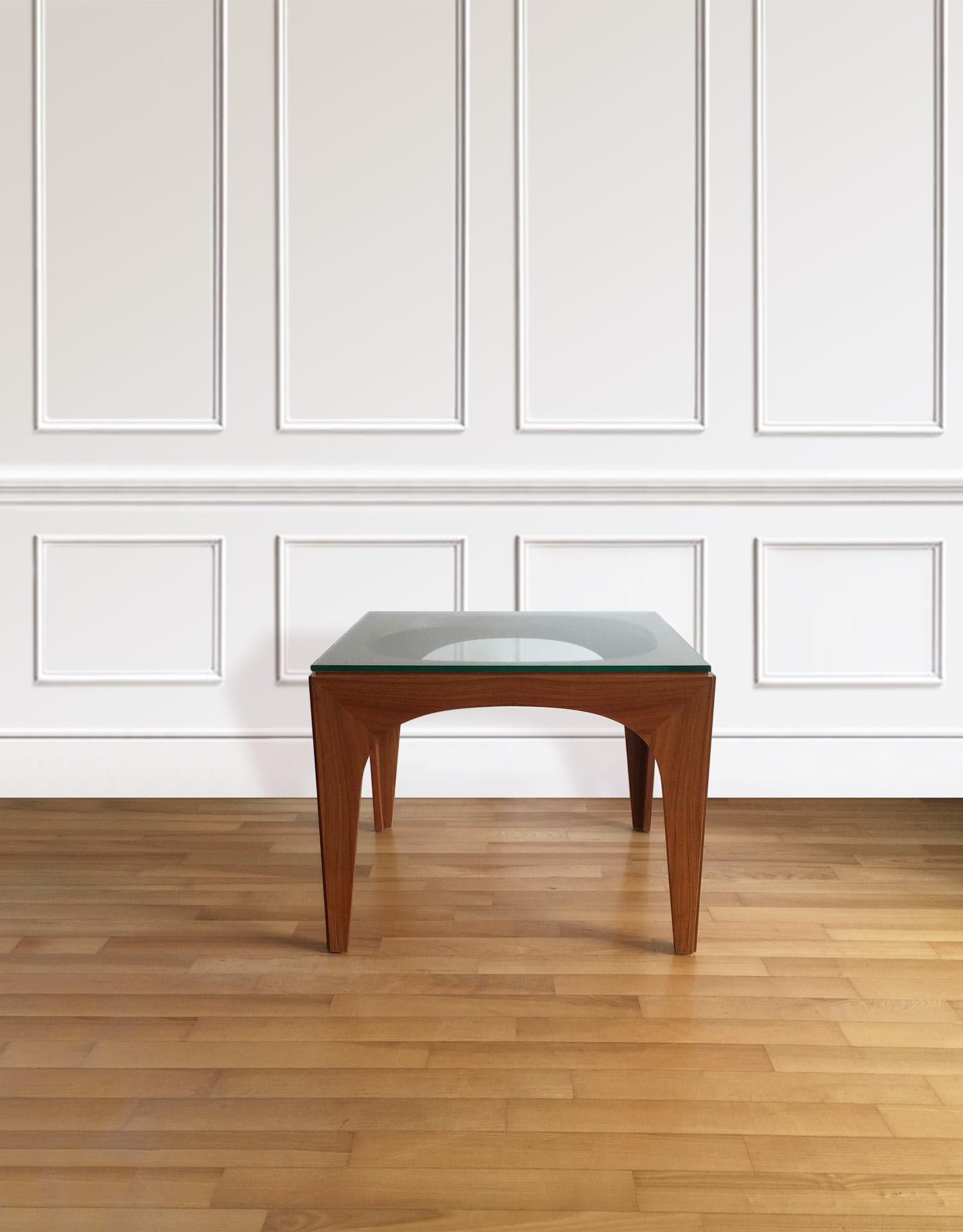 A coffee table produced in the 1960s by the German company Hohnert. Beautiful, geometric design. Hard to find these days, especially with the glass.