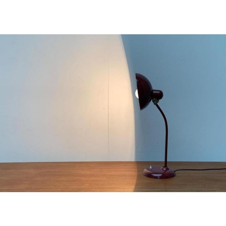 Tedesco Lampada da tavolo 6556 di Christian Dell, 1960, metà secolo, Germania, rosso scuro in vendita