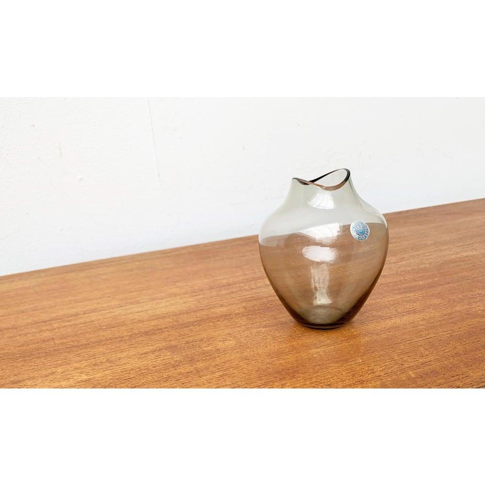 Jarrón de cristal Fischmaul alemán de mediados de siglo, de Hirschberg, años 60, en muy buen estado. Diseñado de 1960 a 1969 Esta pieza tiene una marca de atribución.

Más información:
Materiales: Vidrio
Estilos: Moderno de mediados de siglo
País de