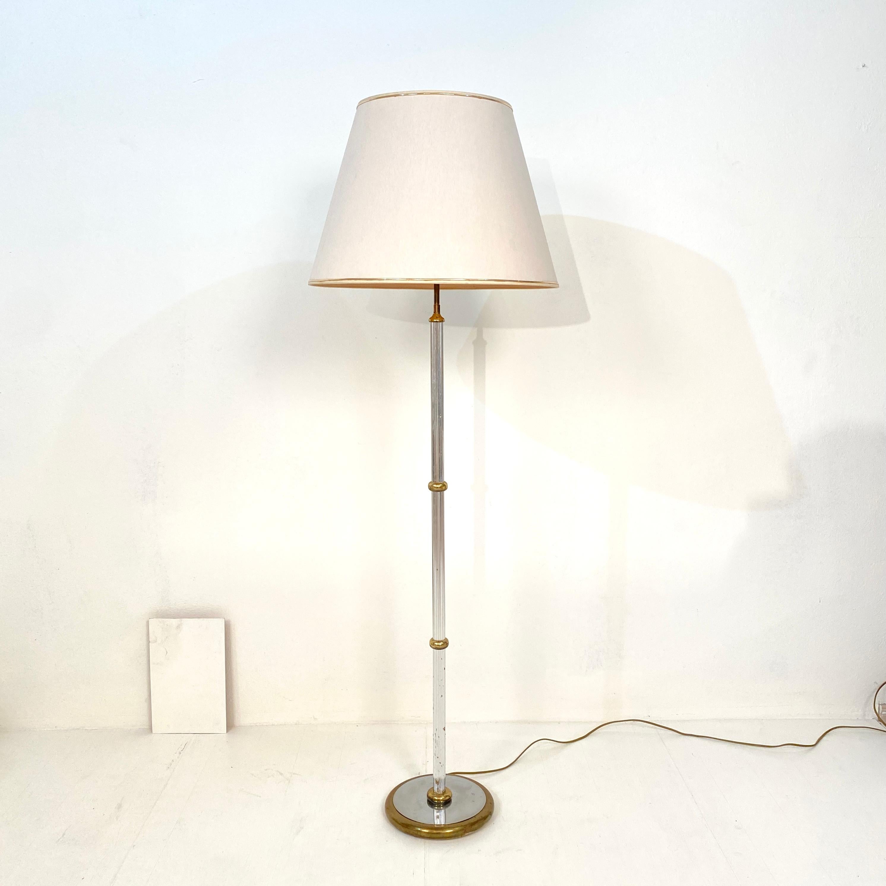 This midcentury floor lamp was made by Aro-Leuchte in Germany in the 1970s. It is mad out of chrome and brass. The original lamp shade is made out of fabric.
A unique piece which is a great eye-catcher for your antique, modern, Space Age or
