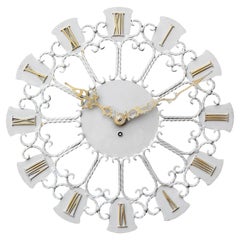 Reloj de pared de hierro alemán de mediados de siglo