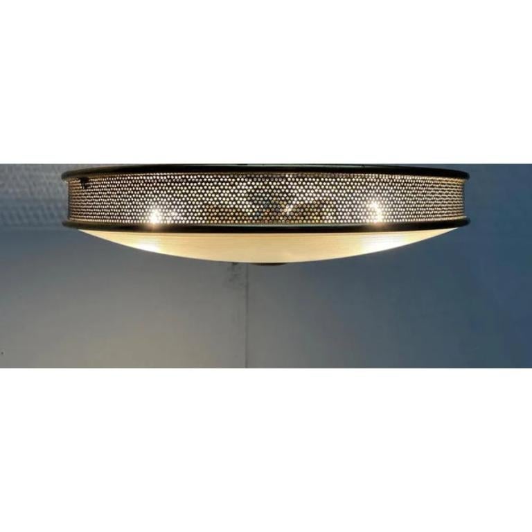 Mid-Century German Metal, Mesh and Glass Plafoniere Ceiling Lamp, 1960s, in Very Good conditions. Designed 1950 to 1959
Up to 250V (Europe/UK Standard).The wiring of this item may be original and might need replacement, if not specified