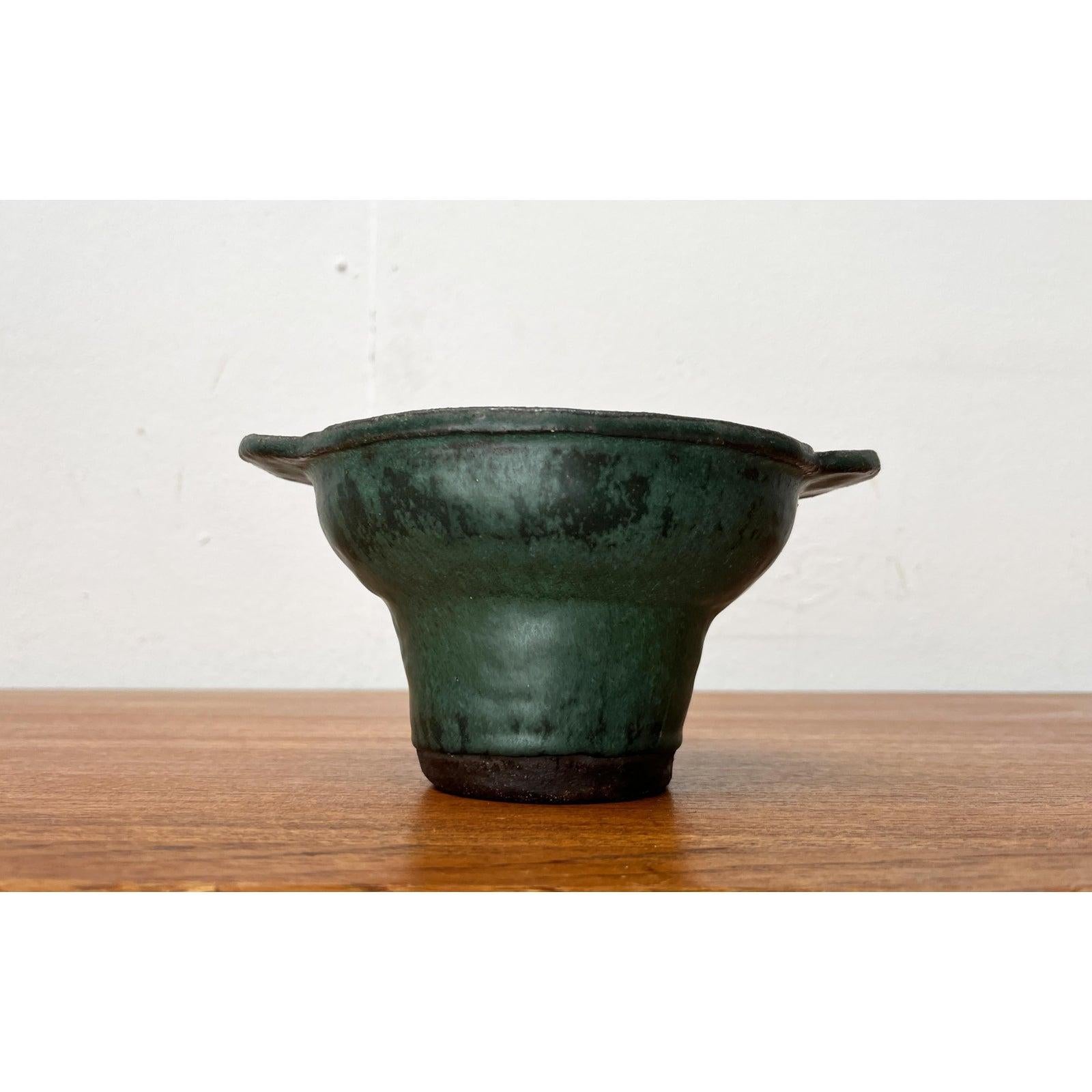 Mid-Century German Minimalist Studio Pottery Bowl, 1960s, in Very Good conditions. Designed 1960 to 1969.

Additional information:
Materials: Ceramic
Color: Brown
Styles: Mid-Century Modern, Minimalist
Country of Origin: Germany
Item Type: Vintage,