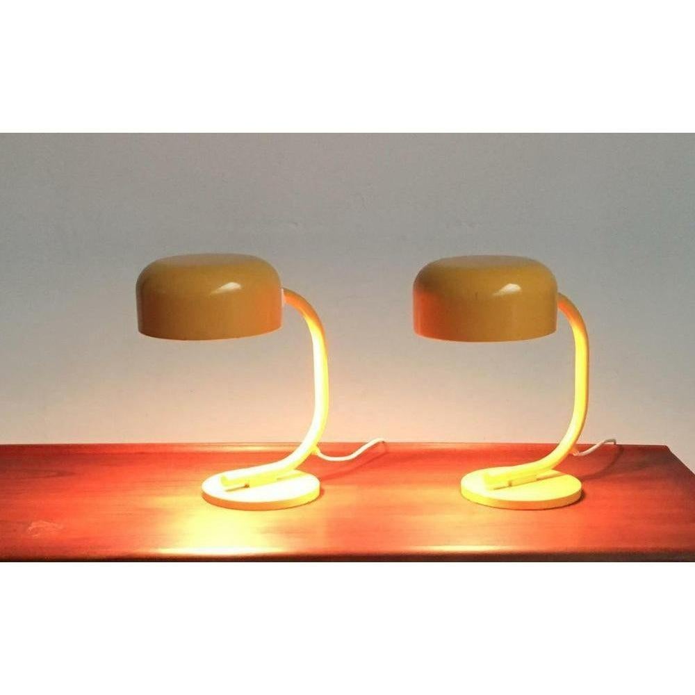 Minimalist table lamps by Kaiser glow in white.

A minimalist design by Kaiser. The lamp convinces with its simple design language. The coloring completely in yellow supports this impression. The reflector screen can be turned at a certain angle.