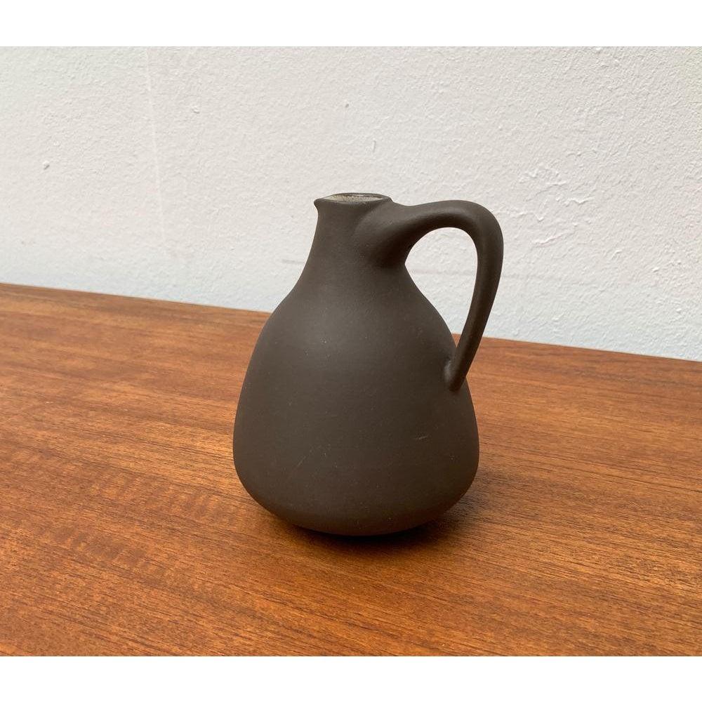 Mid-Century German Minimalist Vase by Hildegard and Peter Delius for Hamelner Töpferei, 1960s, in Very Good conditions. Designed 1960 to 1969 This piece has an attribution mark.

Additional information:
Materials: Ceramic
Style: Mid-Century Modern,