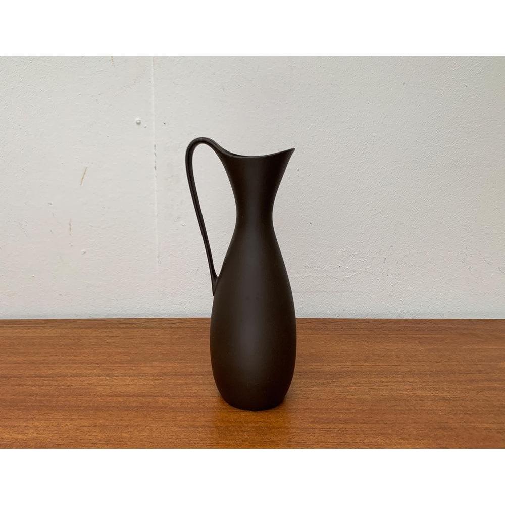 Mid-Century German Minimalist Wormser Terra-Sigillata Pottery Carafe Vase, 1960s, in Very Good conditions. Designed 1960 to 1969 This piece has an attribution mark.

Additional information:
Materials: Ceramic
Color: Brown
Styles: Mid-Century Modern,