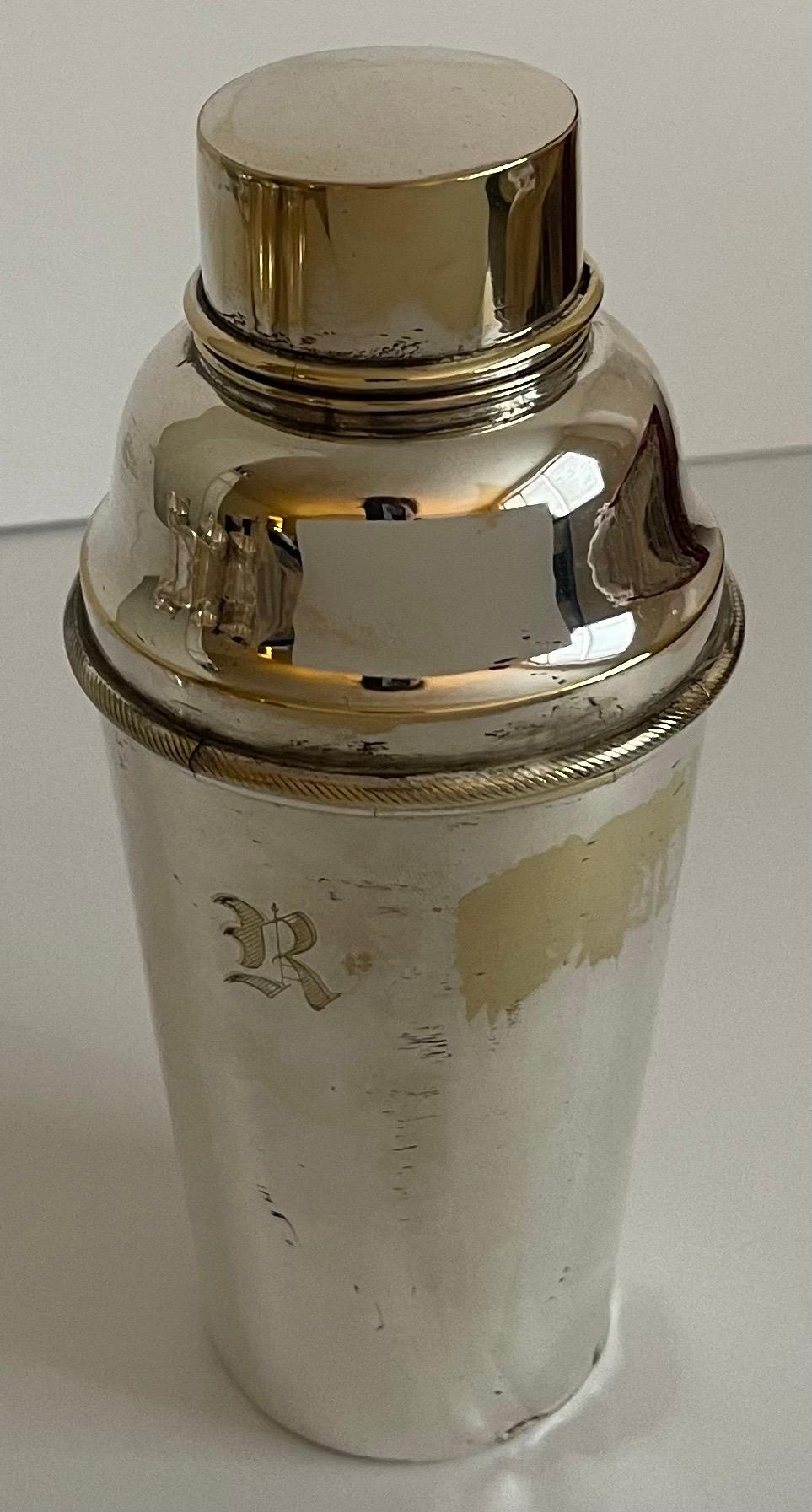 Mid-century silver plated cocktail shaker. Made in Germany. Single R monogram. 
Shaker is newly professionally polished to a high shine but has overall areas of silver loss.