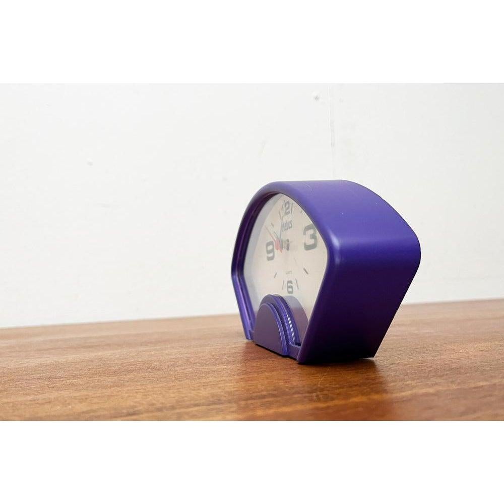 Mid-Century German Space Age Alarm Clock from Mebus, 1960s, in Very Good conditions. Designed 1960 to 1969 This piece has an attribution mark.

Additional information:
Materials: Plastic
Color: Purple
Styles: Mid-Century Modern
Country of Origin: