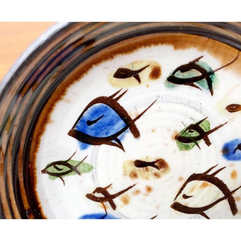 Bol en poterie de studio allemande du milieu du siècle avec des motifs de poissons de la poterie Bücking-Börnsen, années 1960, en très bon état. Conçue de 1960 à 1969 Cette pièce porte une marque d'attribution.

Informations complémentaires