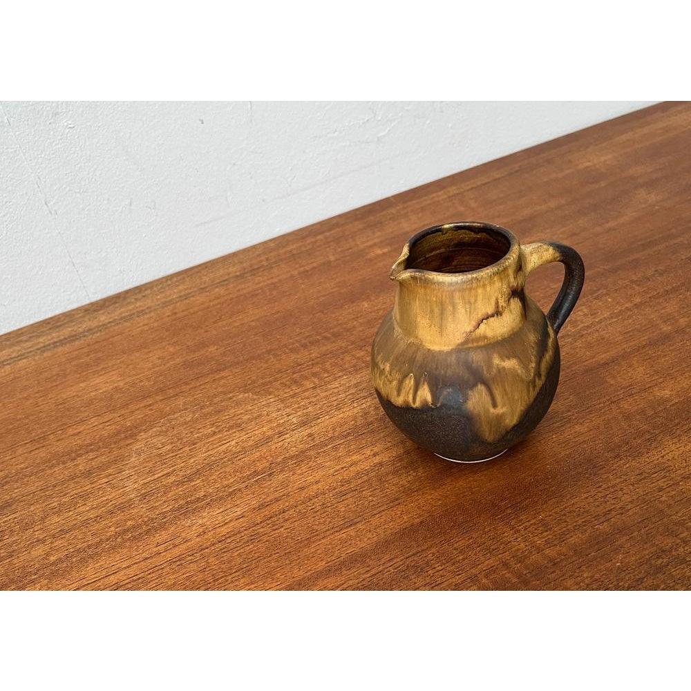 Vaso a caraffa in Studio Pottery di Otto Wichmann, anni '60, in ottime condizioni. Disegnato tra il 1960 e il 1969 Questo pezzo ha un marchio di attribuzioneÈ completamente autentico 

Informazioni aggiuntive:
Materiali: Ceramica
Stili: Medioevo