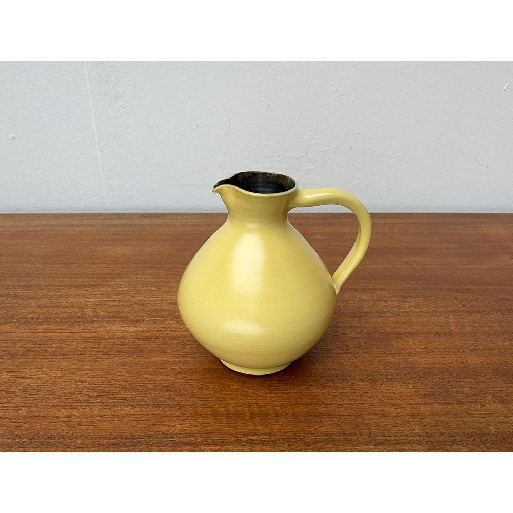 Vaso a caraffa in Studio Pottery tedesco di metà secolo di Wilhelm Diebener per Gothaer Keramik, anni '60, in ottime condizioni. Progettato tra il 1960 e il 1969 Questo pezzo ha un marchio di attribuzione.

Informazioni aggiuntive:
Materiali: