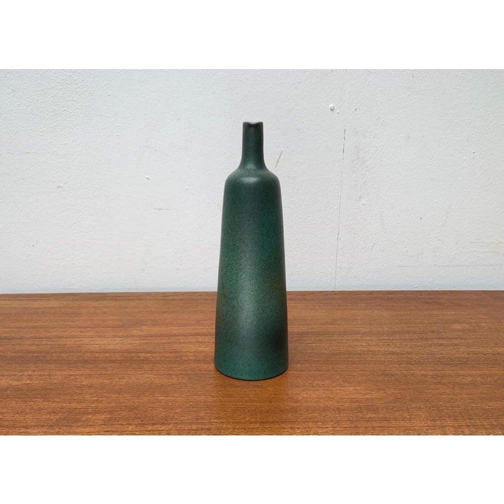 Mid-Century German Studio Pottery Minimalist Carafe Vase from Brockmann Extertal, 1960s, in Very Good conditions. Designed 1960 to 1969 This piece has an attribution markIt is completely authentic 

Additional information:
Materials: Ceramic
Styles: