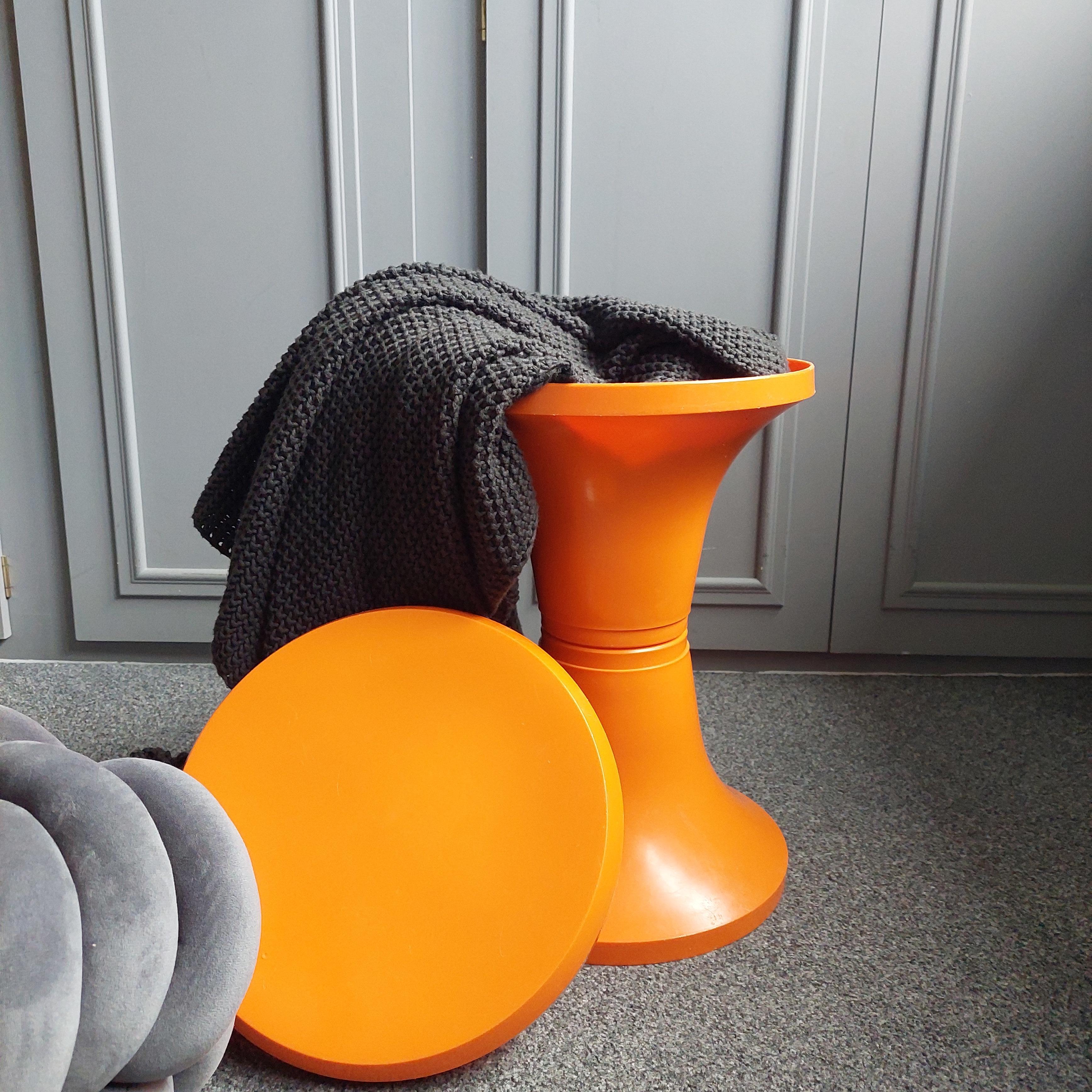 Space Age form the 70s
Most probably from Germany
Tam Tam Style Stool Pop Art  (Henry Massonnet) in bright orange

Step into nostalgia with this stool, a timeless design masterpiece crafted uner the visionary designer Henry Massonnet style. 
This