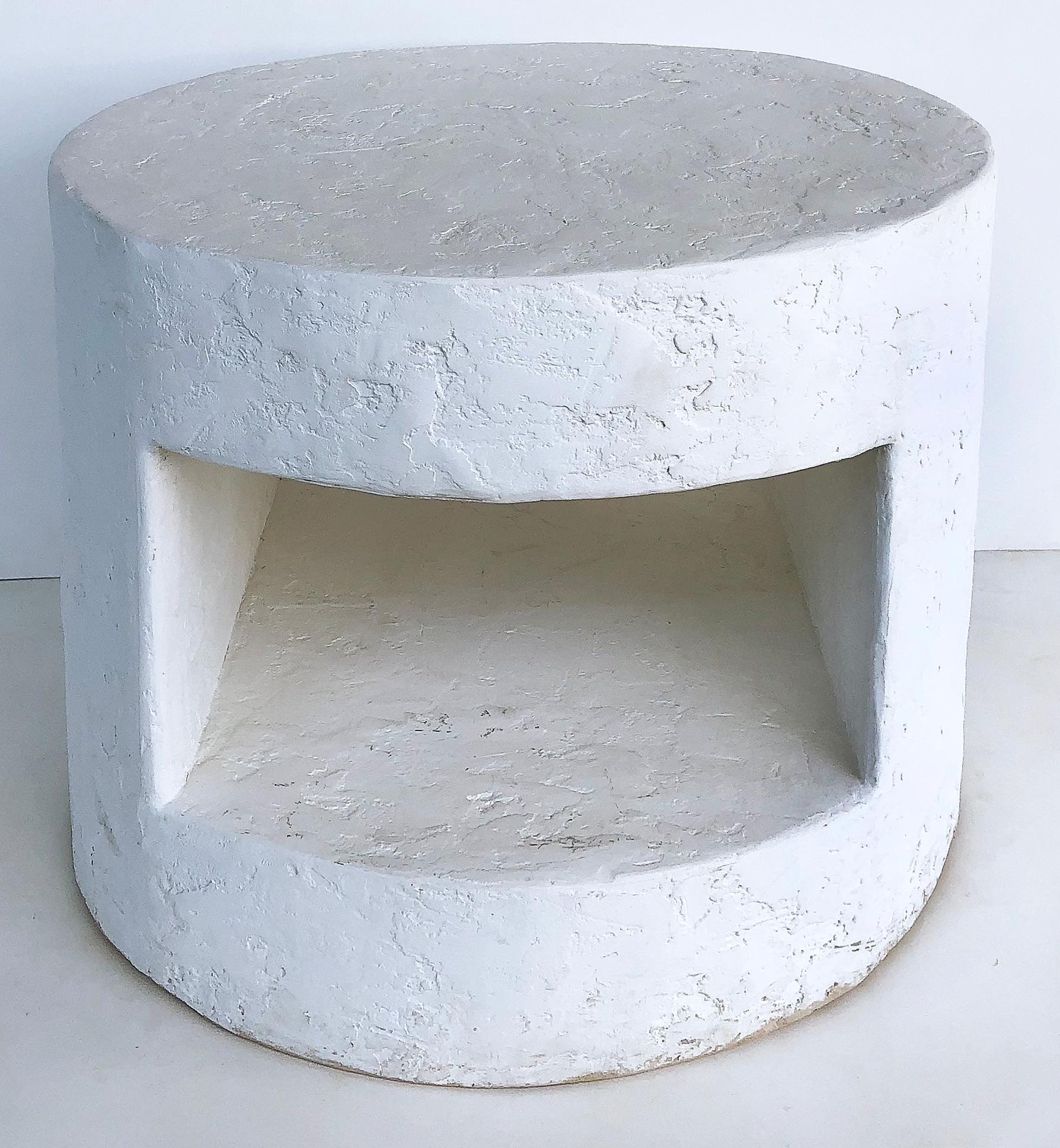 midcentury Gesso Finish Table Manner of John Dickinson.

Offered for sale is a Mid-Century Modern round side table with a gesso/plaster finish and a cut out interior. The table is in the manner of John Dickinson. Possibly gesso or plaster over