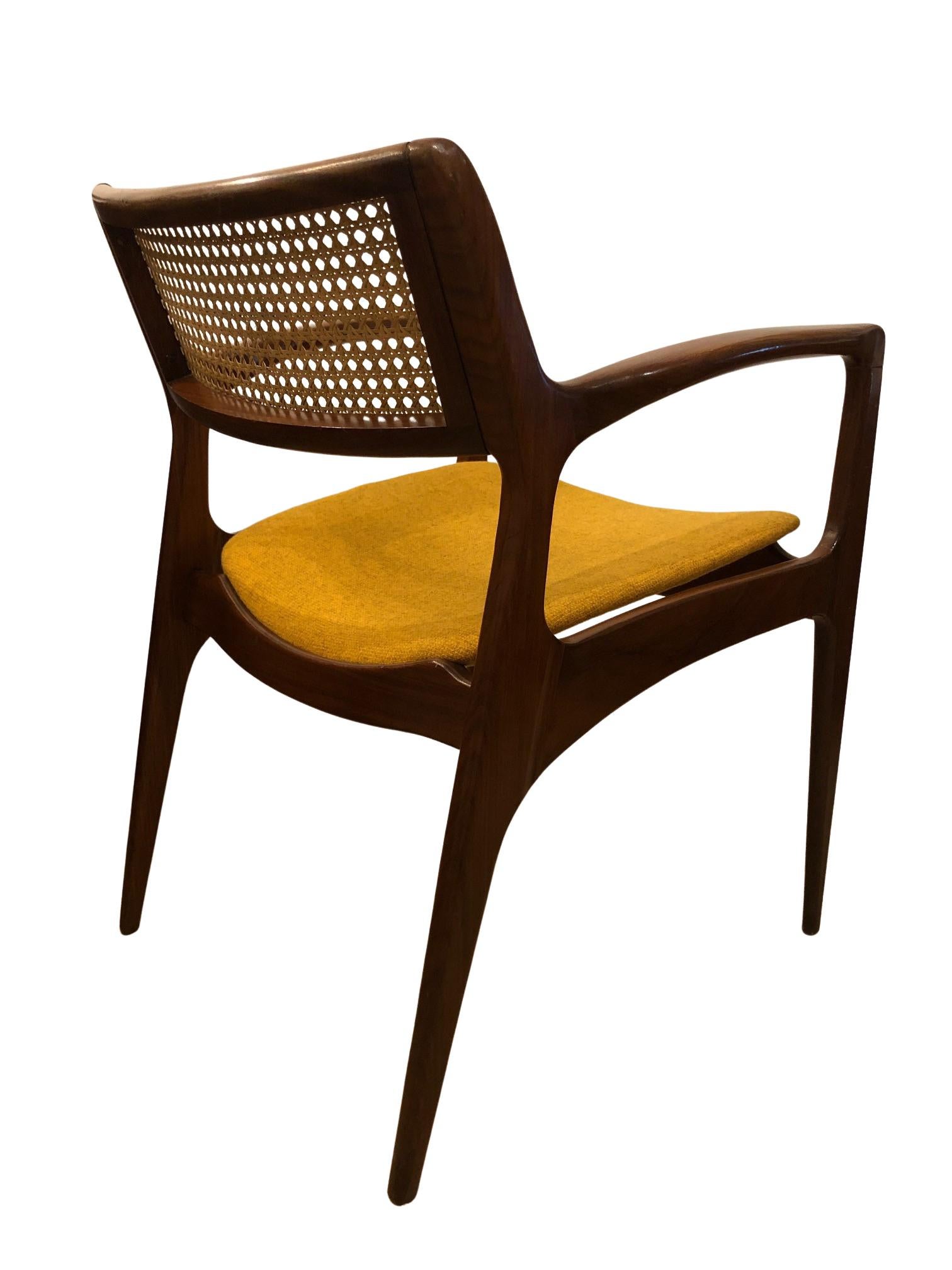 Chair model GFM-120 appears extremely rarely on the antiquarian market. 

It was designed by Edmund Homa, manufactured by Goscinska Furniture Factory in Poland in the 1960s. Professor Edmund Homa was Polish architect, designer of industrial design