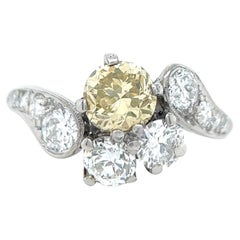 Mid Century GIA 0.75 Carats Fancy Yellow Diamond Platinum Bypass Ring