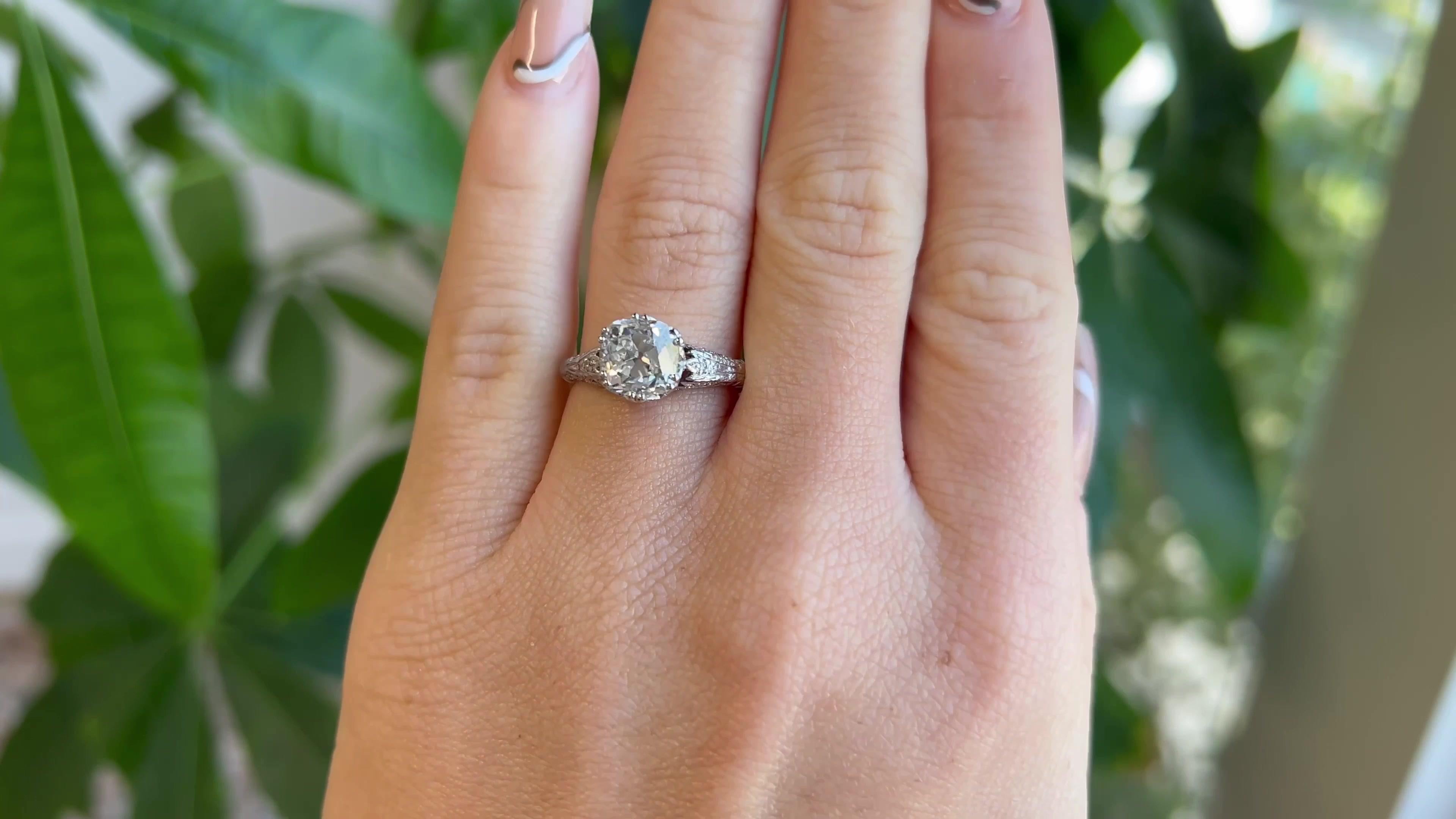 One Mid Century GIA 2.46 Carats Old Mine Cut Diamond Platinum Engagement Ring. Featuring one GIA certified old mine cut diamond of 2.46 carats, accompanied with certificate #5221452403 stating the diamond is J color, SI2 clarity. Accented by 32
