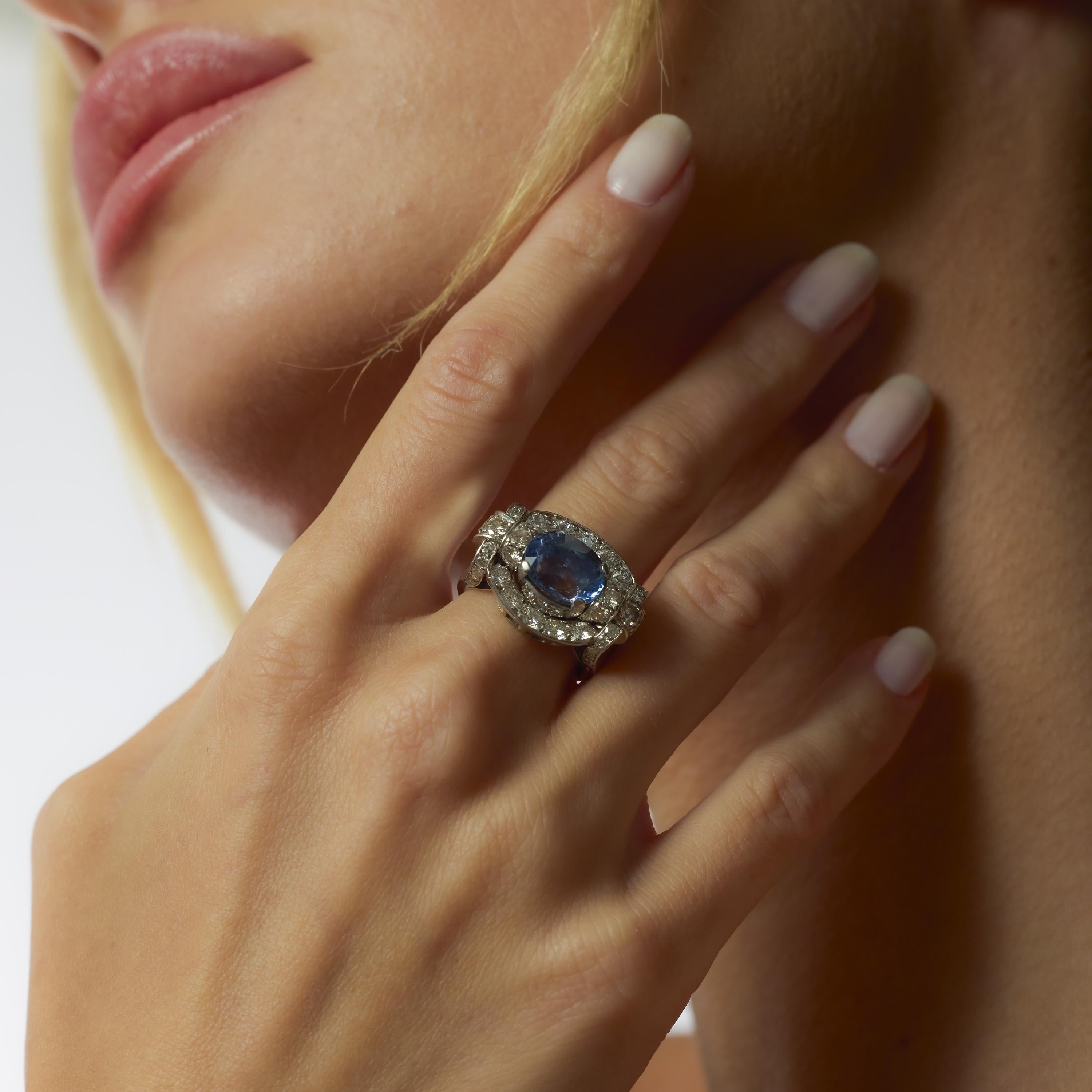 Oval Cut Mid Century GIA 4.55 carat no heat sapphire diamond platinum tank ring For Sale