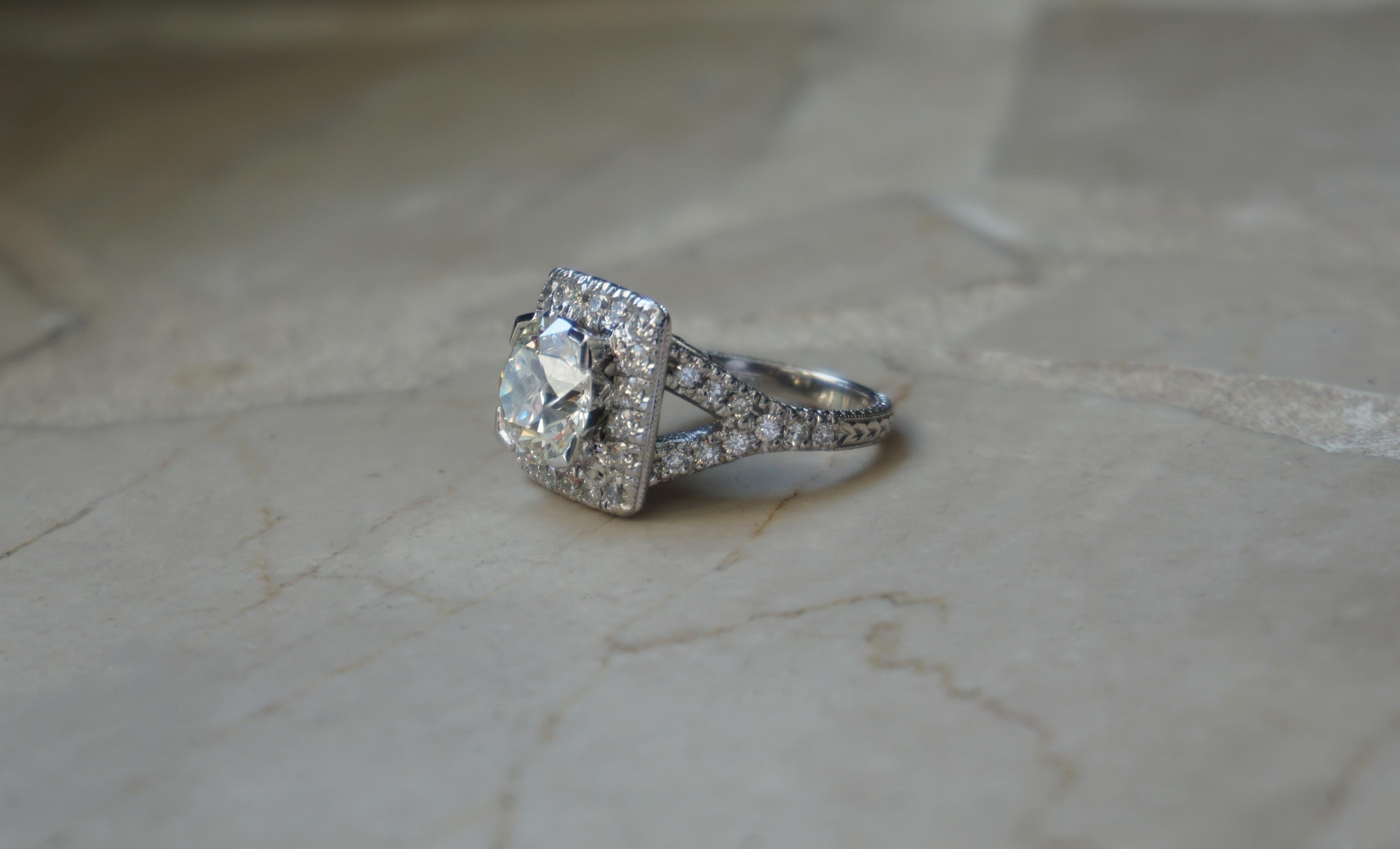 Women's Mid-Century GIA Certified 3.87 Carat European Diamond Halo Ring For Sale