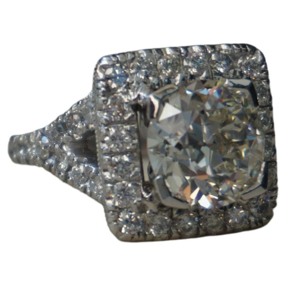 Mid-Century GIA Certified 3.87 Carat European Diamond Halo Ring For Sale