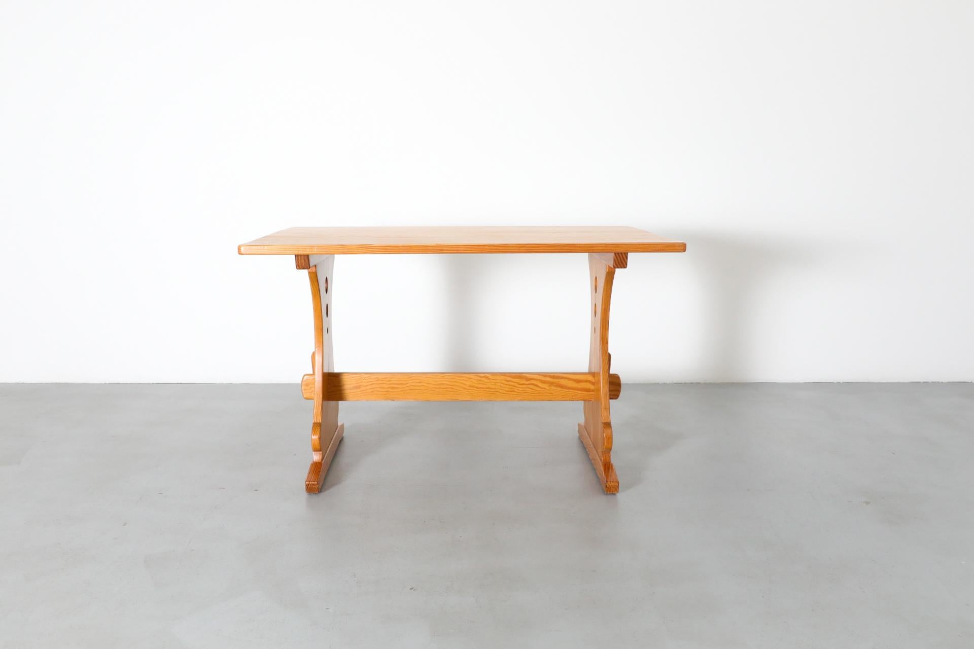 Swedish Mid-Century Gilbert Marklund Inspired Pine Table with Ornate Trestle Base For Sale
