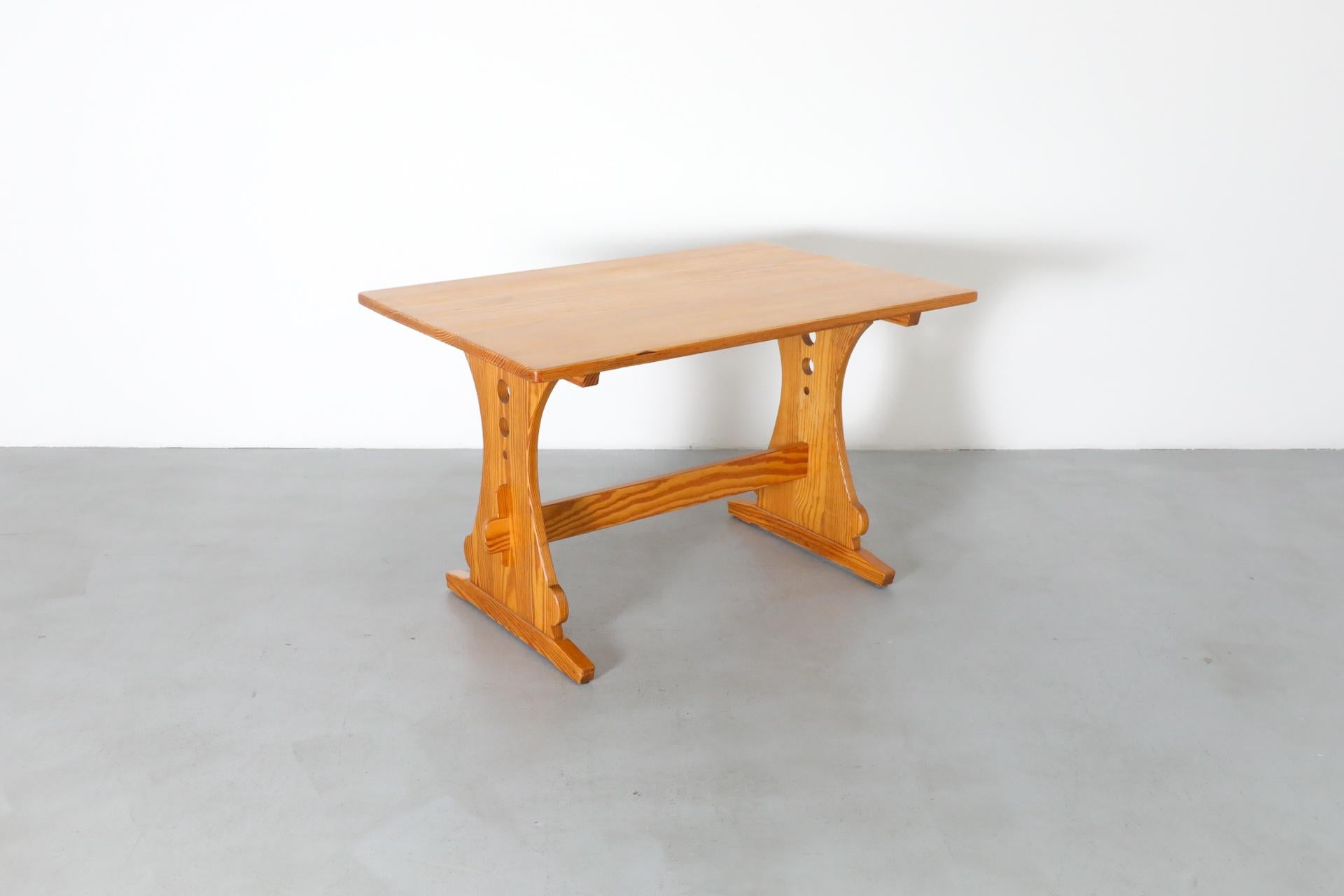 Mid-Century Gilbert Marklund Inspired Pine Table with Ornate Trestle Base For Sale 1