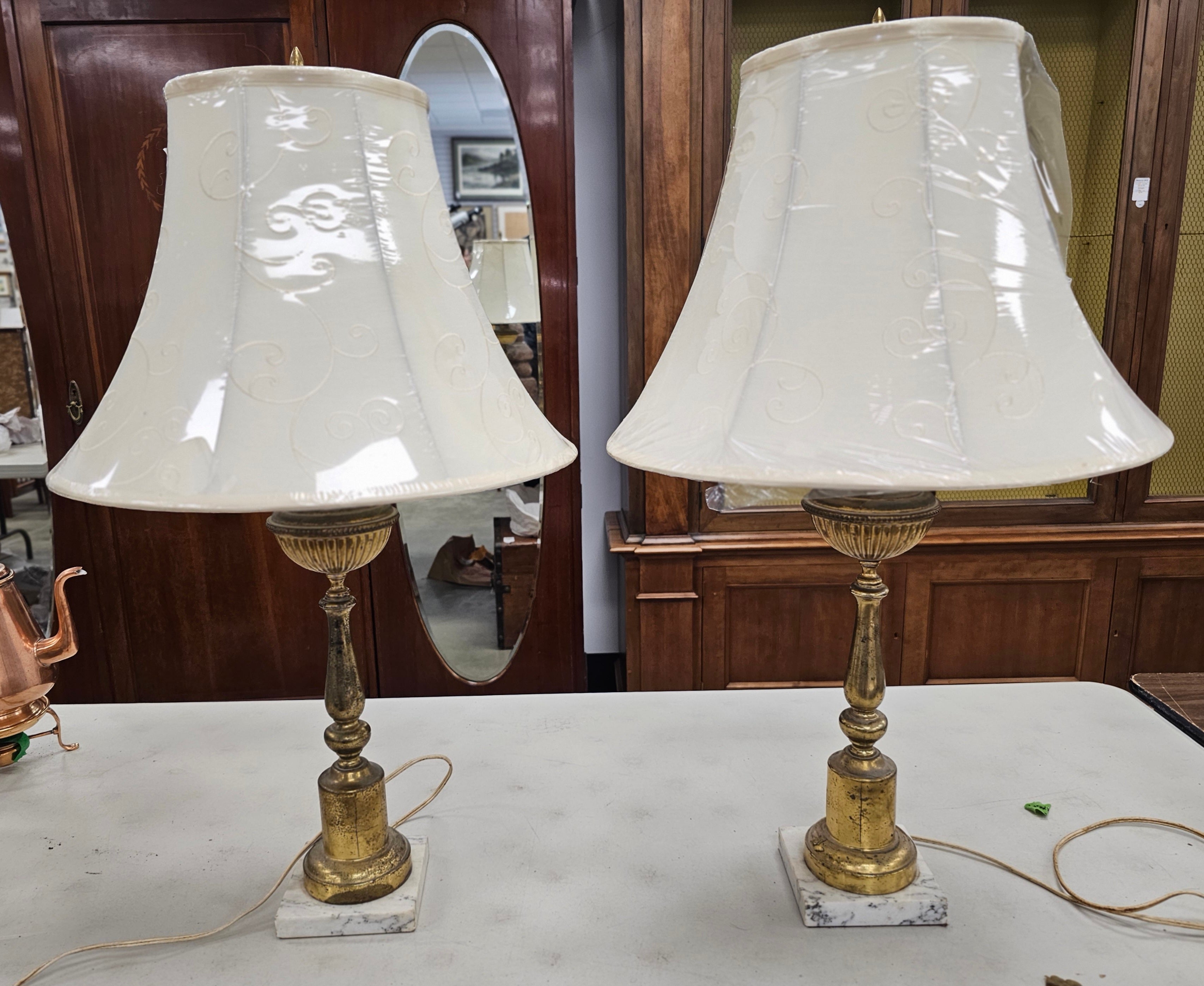 A pair of Mid Century Gilt Metal and Marble Table Lamps.
Measures 5