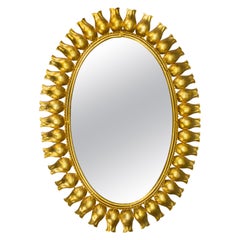 Espejo de Pared Ovalado Sunburst de Metal Dorado de Mediados de Siglo