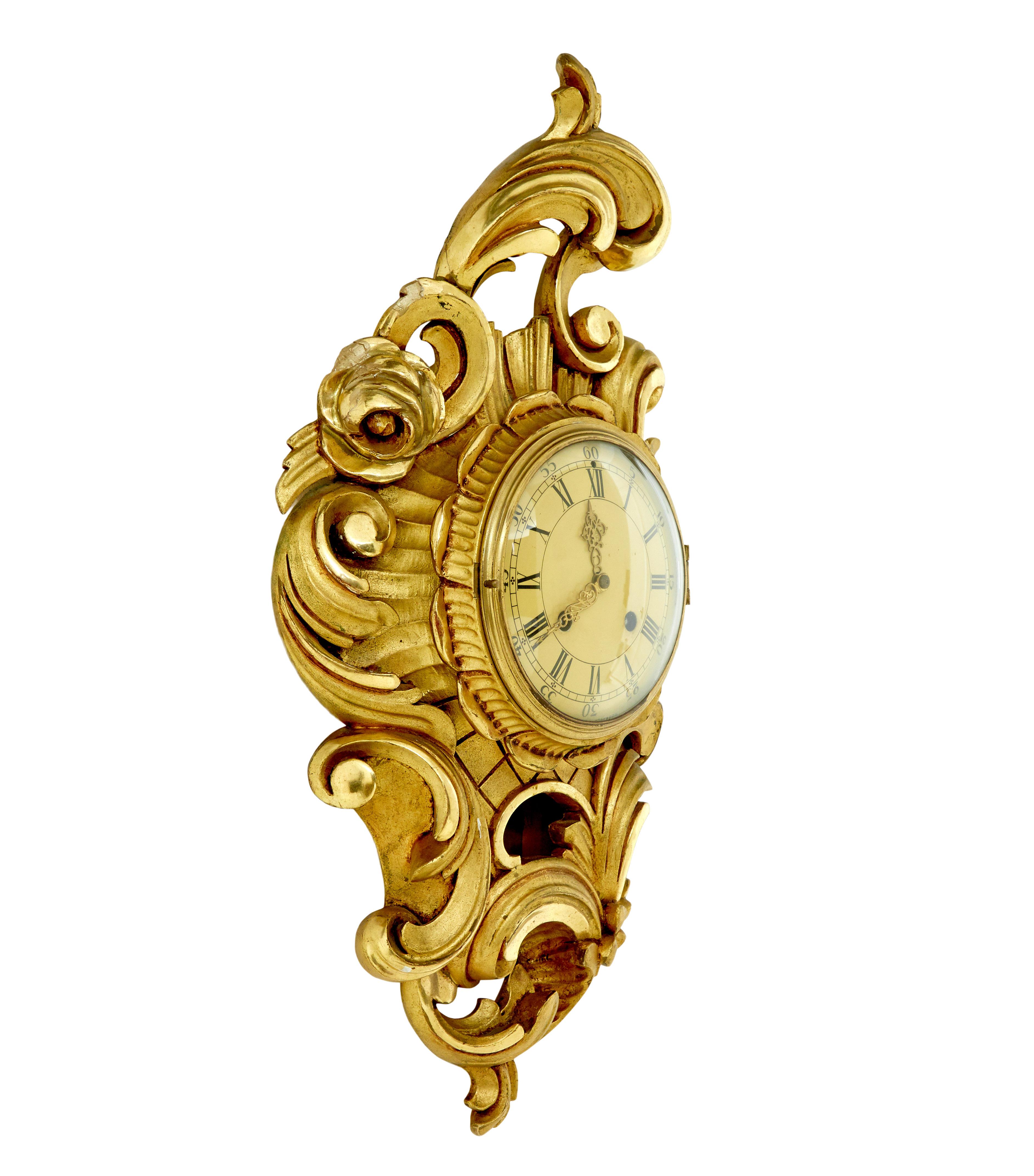 Mid century rococo revival gilt clock by Westerstrand circa 1950.

Good quality rococo influenced clock by well known Swedish maker westerstrand.

Fitted with a twin train 8 day movement and original pendulum.  Enamel clock face with roman numerals