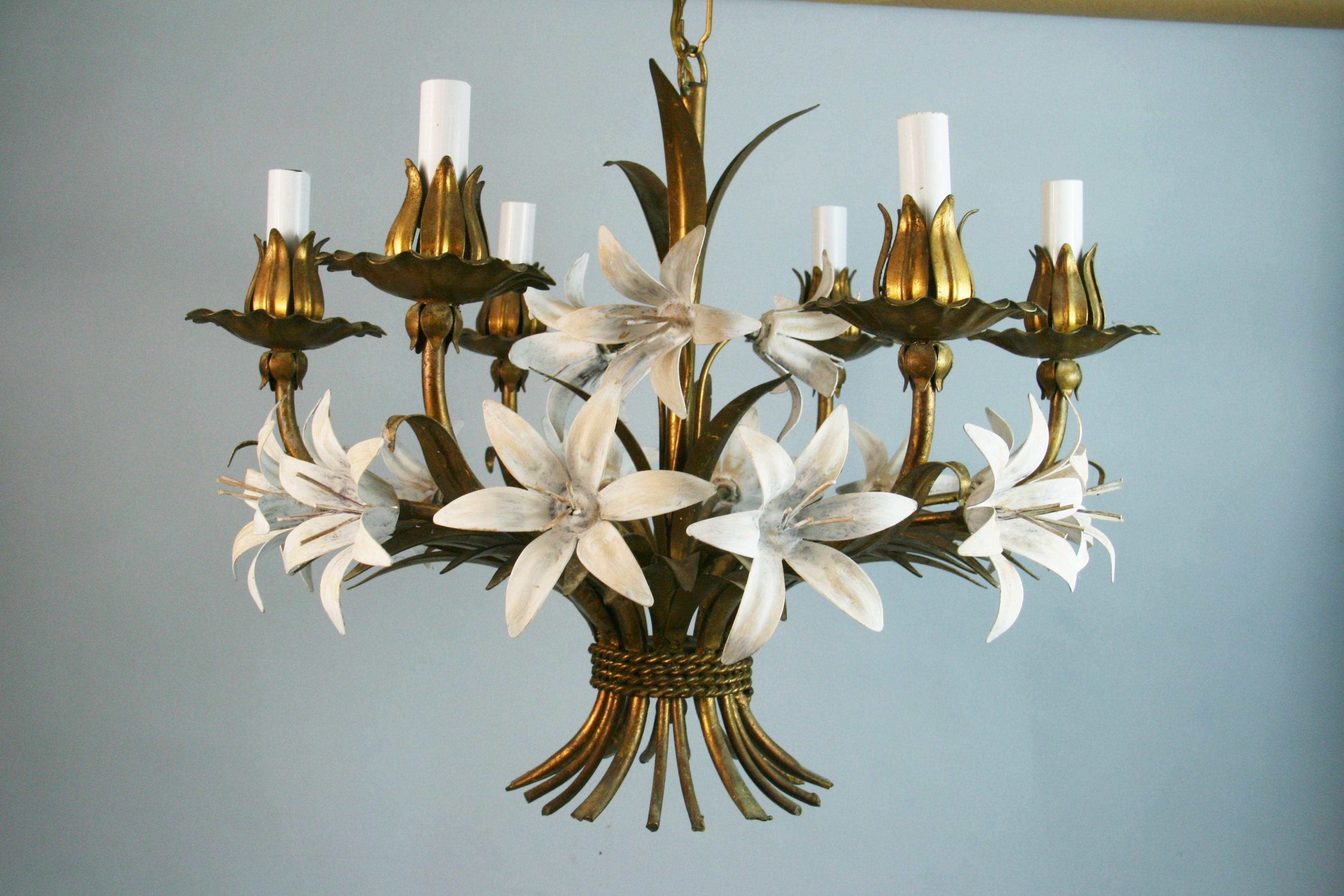 1619 gilt tole Italian six-light chandelier with white flowers.
Take 60 watt max candelabra based bulb.
 