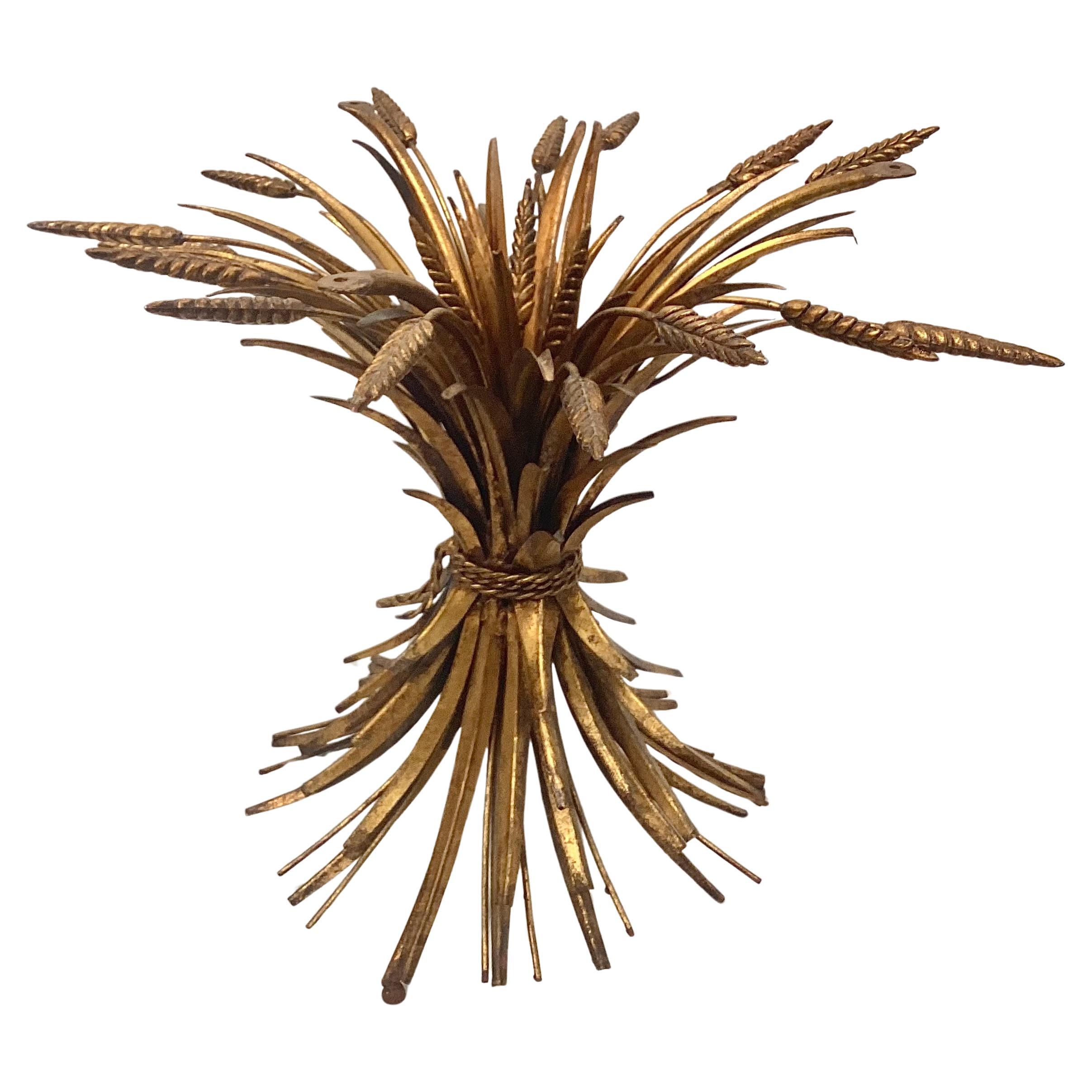 Vintage Coco Chanel side table.
Stunning and unique mid-century modern Hollywood Regency style 'Sheaf of Wheat' side table base. Base features polished brass in the stylized shape of a sheaf of wheat with long curved stalks that fan out gracefully