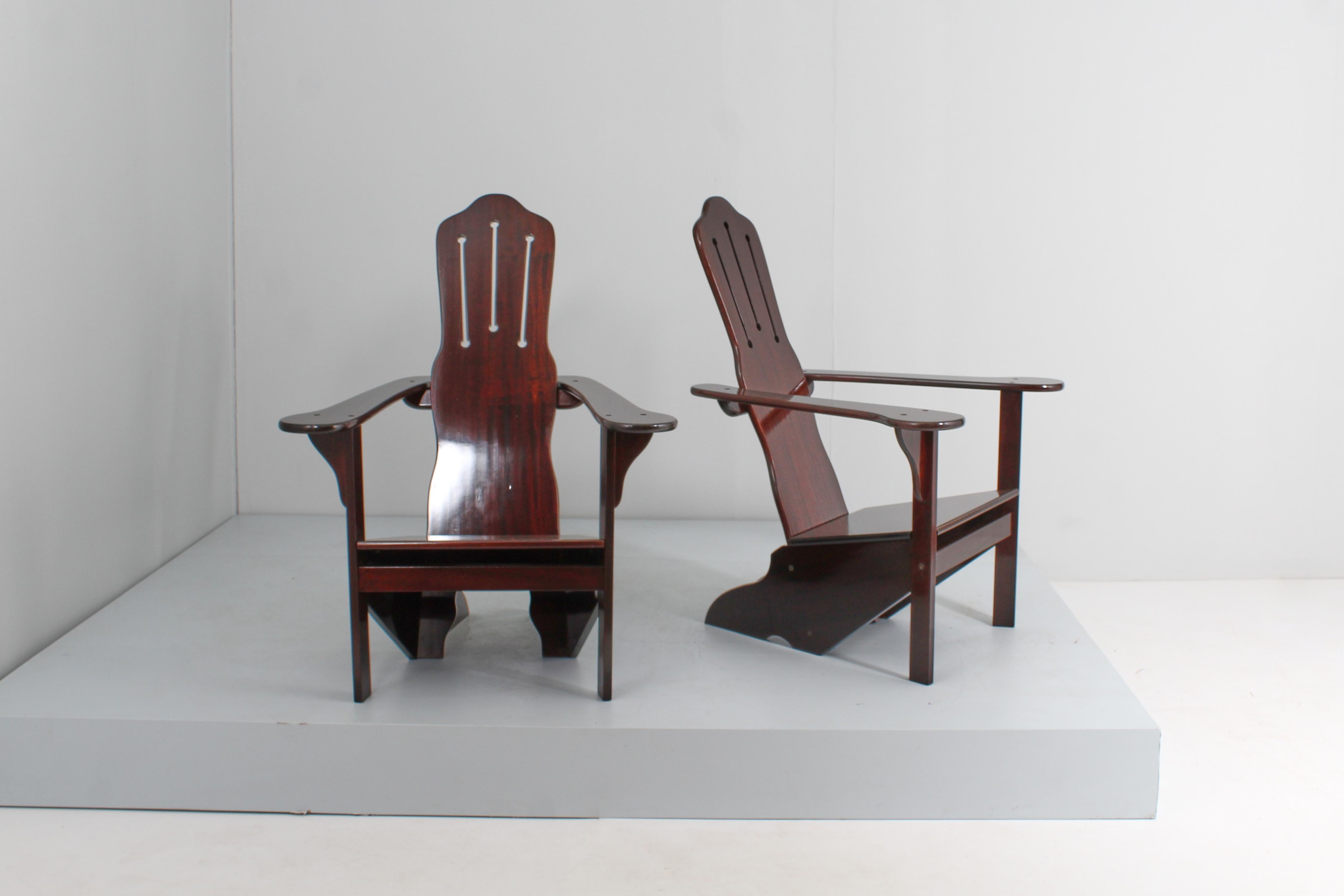 Imposing and rare set of 2 rationalist chairs with curved and straight lines, clean and incisive, entirely in wood, restored. Attributable Gino Levi Montalcini, Italy 1970s.