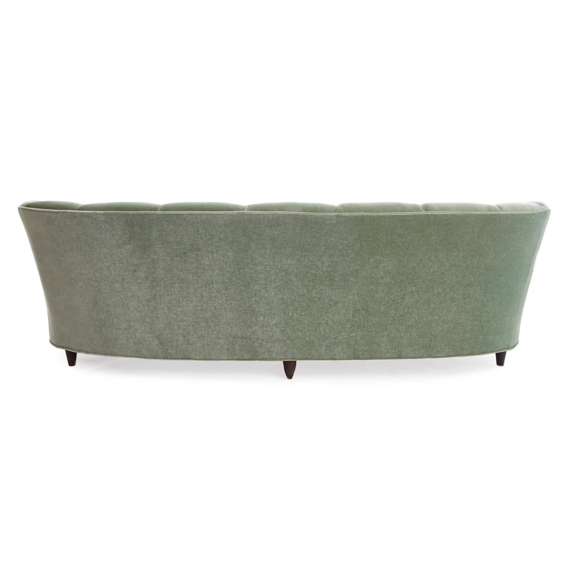 Exceptional midcentury Gio Ponti sofa, designed for Casa e Giardino. Newly reupholstered in a lush peridot mohair. Retains original tapered legs and supple curvature. Down stuffed and extravagantly elegant scalloped edge cushions to perfectly nestle
