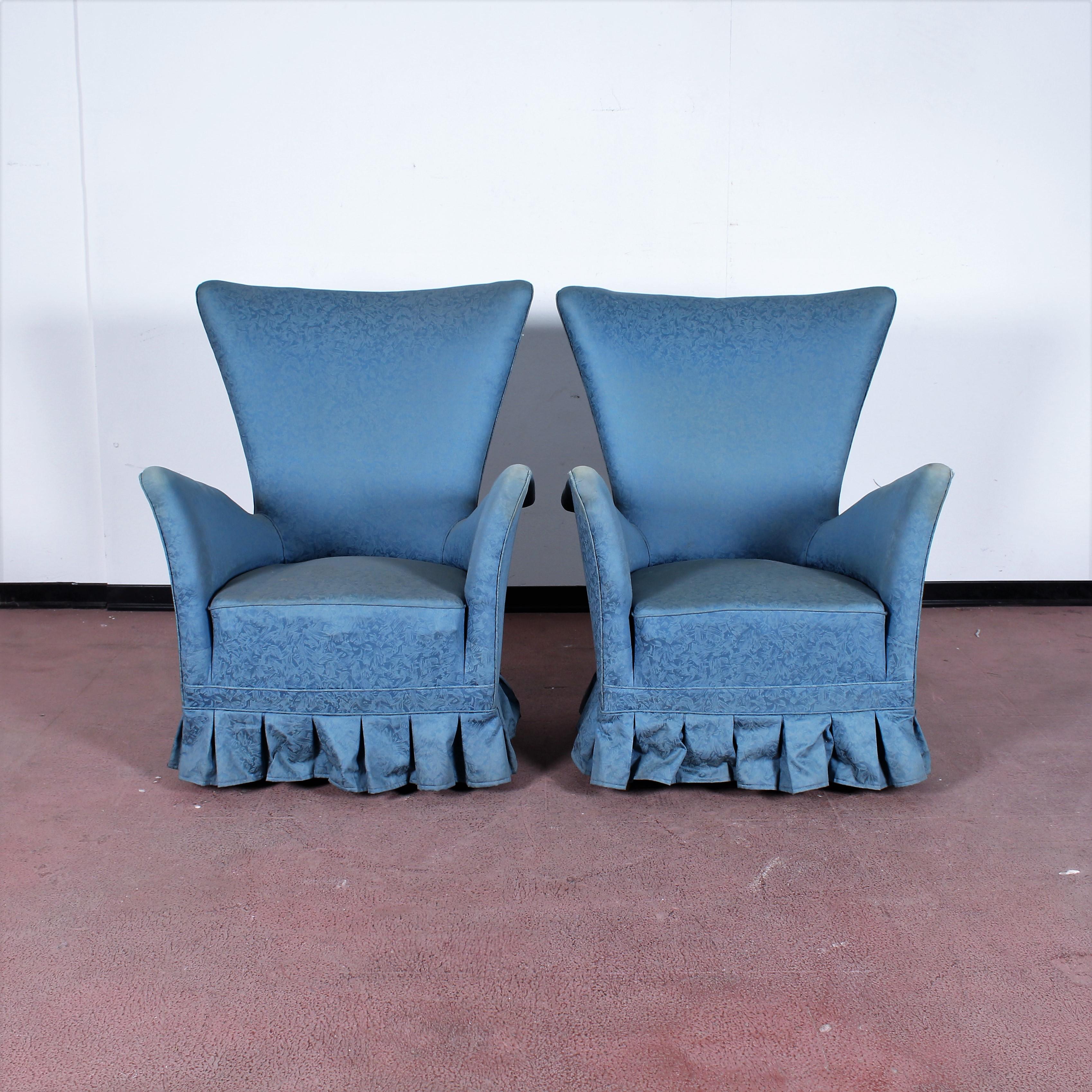 Set of two armchairs with wooden structure, blue fabric covering with relief abstract motifs, and conical feet. Gio Ponti style, Italian manufacture in 1950s
Wear consistent with age and use.
 