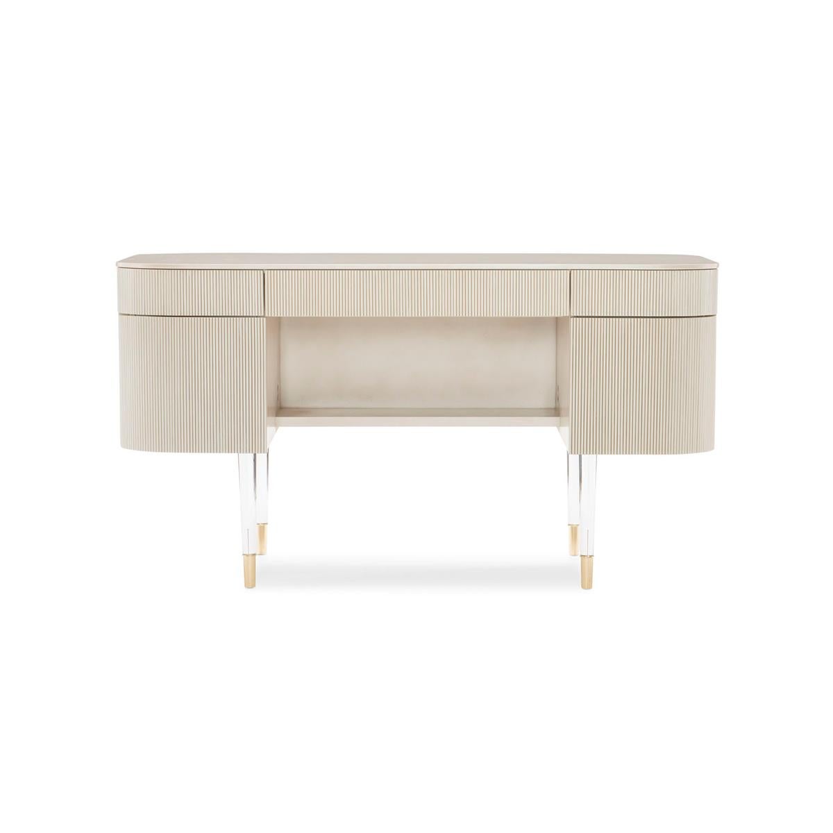Glamorous storage comes to life in this elegant creation. With a touch of femininity, its graceful design creates a place for everything and somewhere to keep everything in its place. Use it as a desk or dressing table—or both!

Its rounded