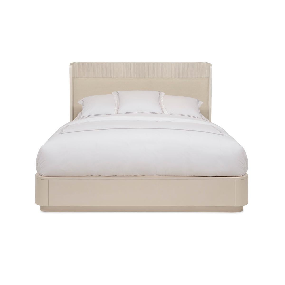 With a softly curved headboard that ensconces you in style, it boasts a thoughtful combination of luxe materials. As you lay back and rest your head, you’ll enjoy the soft support of an exquisitely upholstered headboard framed with wood trim