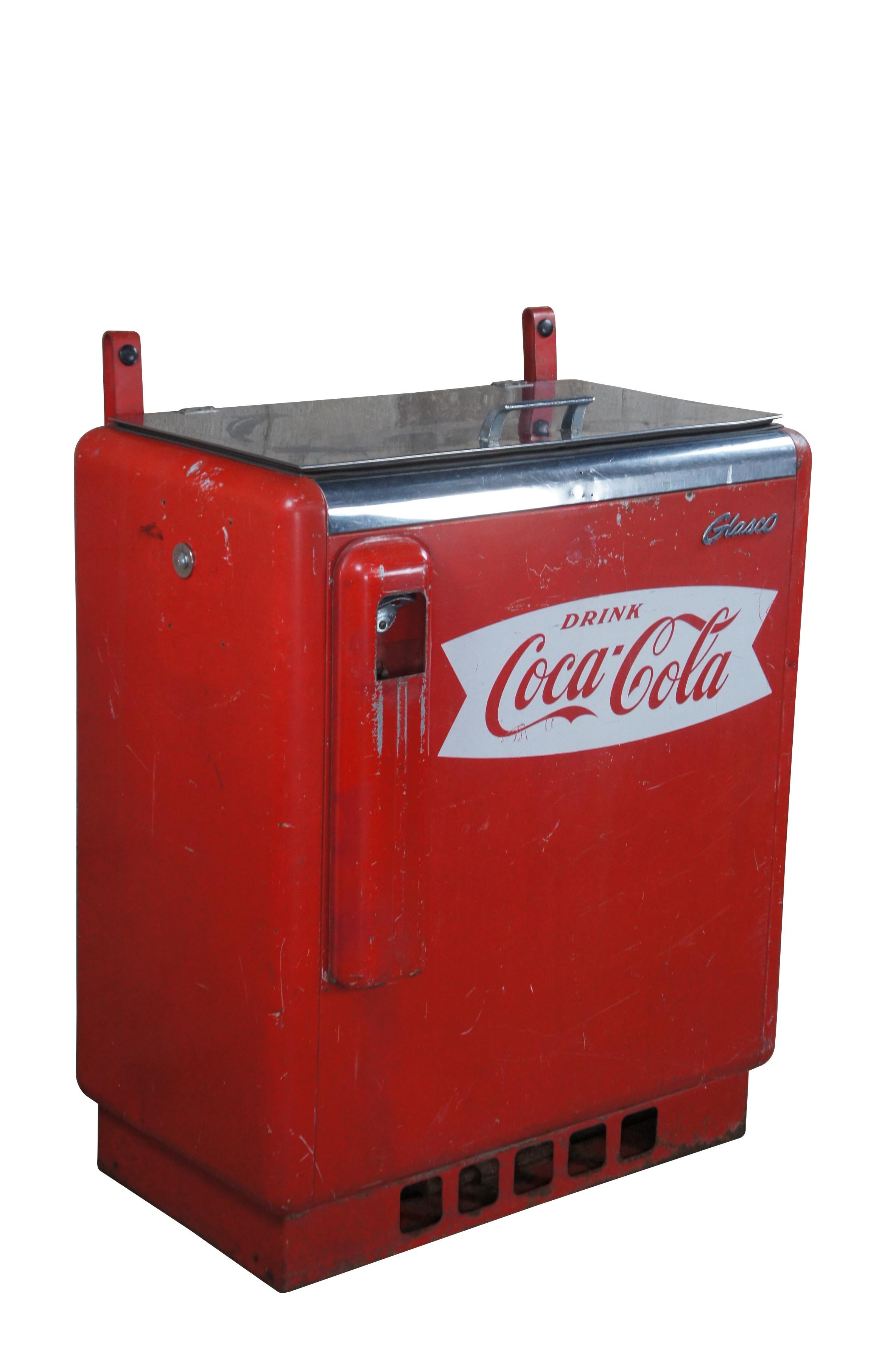 The Glasco GBV50 Slider or Glasco Starlet (its marketing name) is a cooler and vending machine first introduced by Glasco in 1957. This is a chest-type cooler adapted to vend bottles manually with a coin entry plate to the left side of the machine.