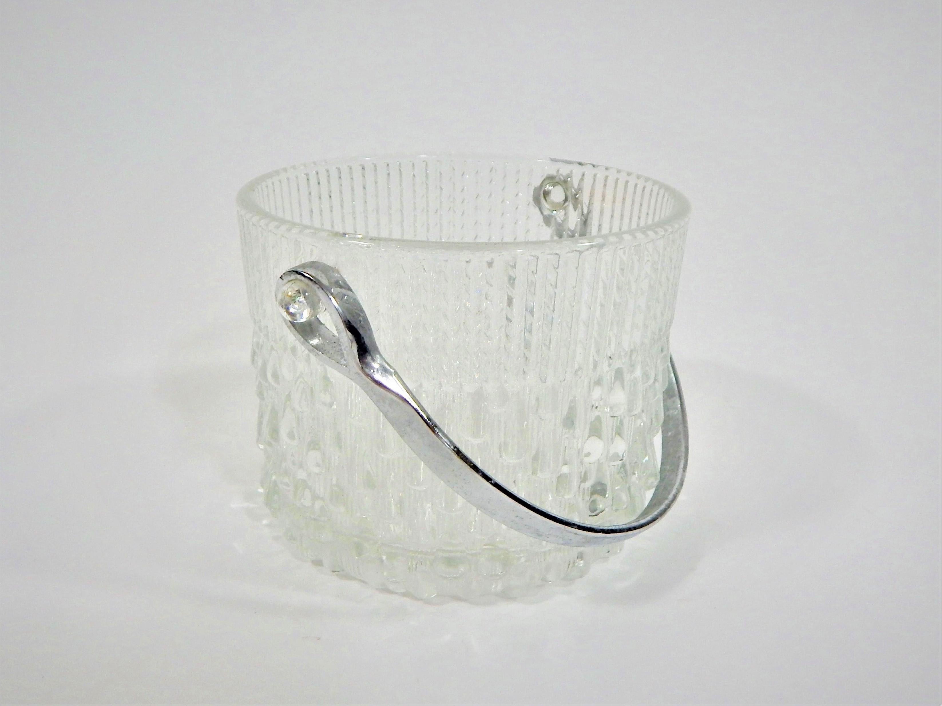 Small glass ice bucket for bar or barcart. Mid-Century Modern Design. Marked made in France. Chrome handle.