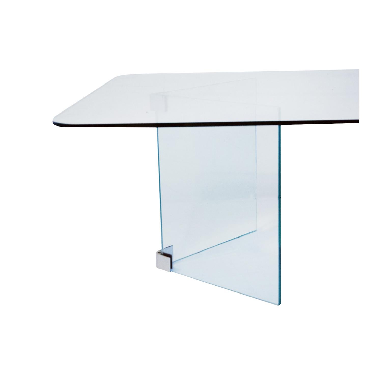 The plated metal fittings forming corner joints between two pieces of glass, with two supports at right angles for the to glass. Pace were the only company to make this type and style of table with right angles of metal with Allen screws to gently