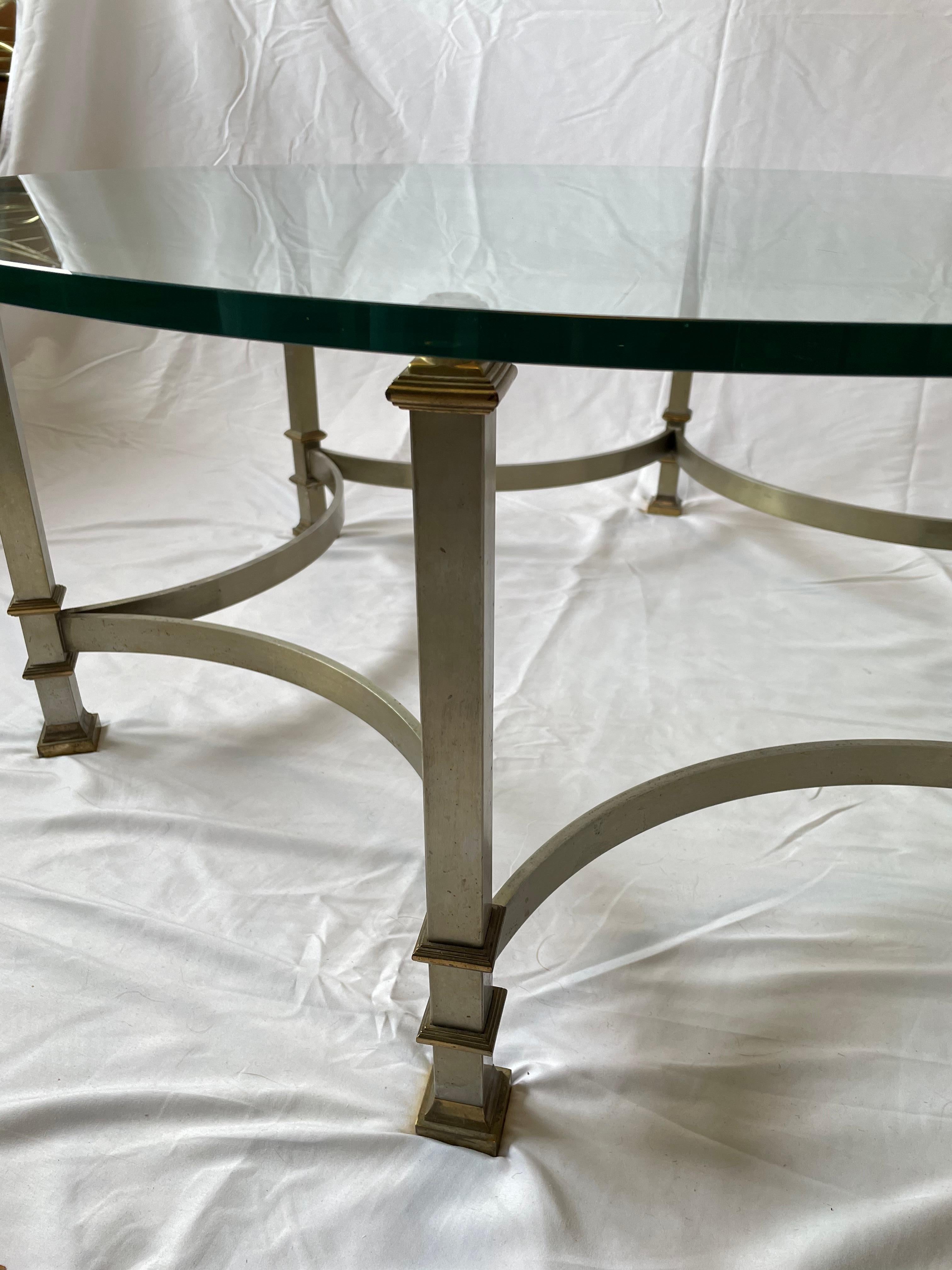 Regency Mid Century Glass and Steel Coffee Table with Brass Mounts Maison Jansen style For Sale
