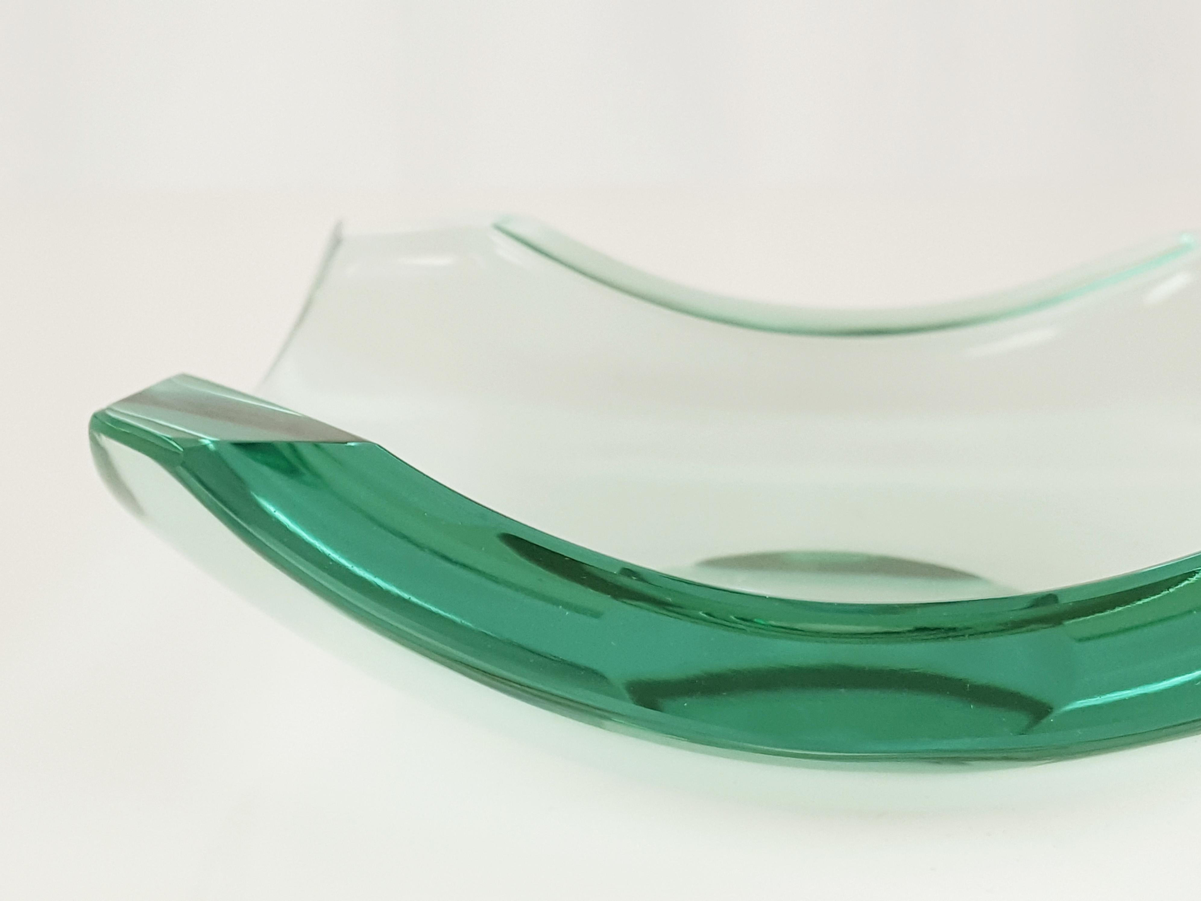 This cut glass ashtray was manufactured by Erwin Burger for Fontana Arte in the 1960s.