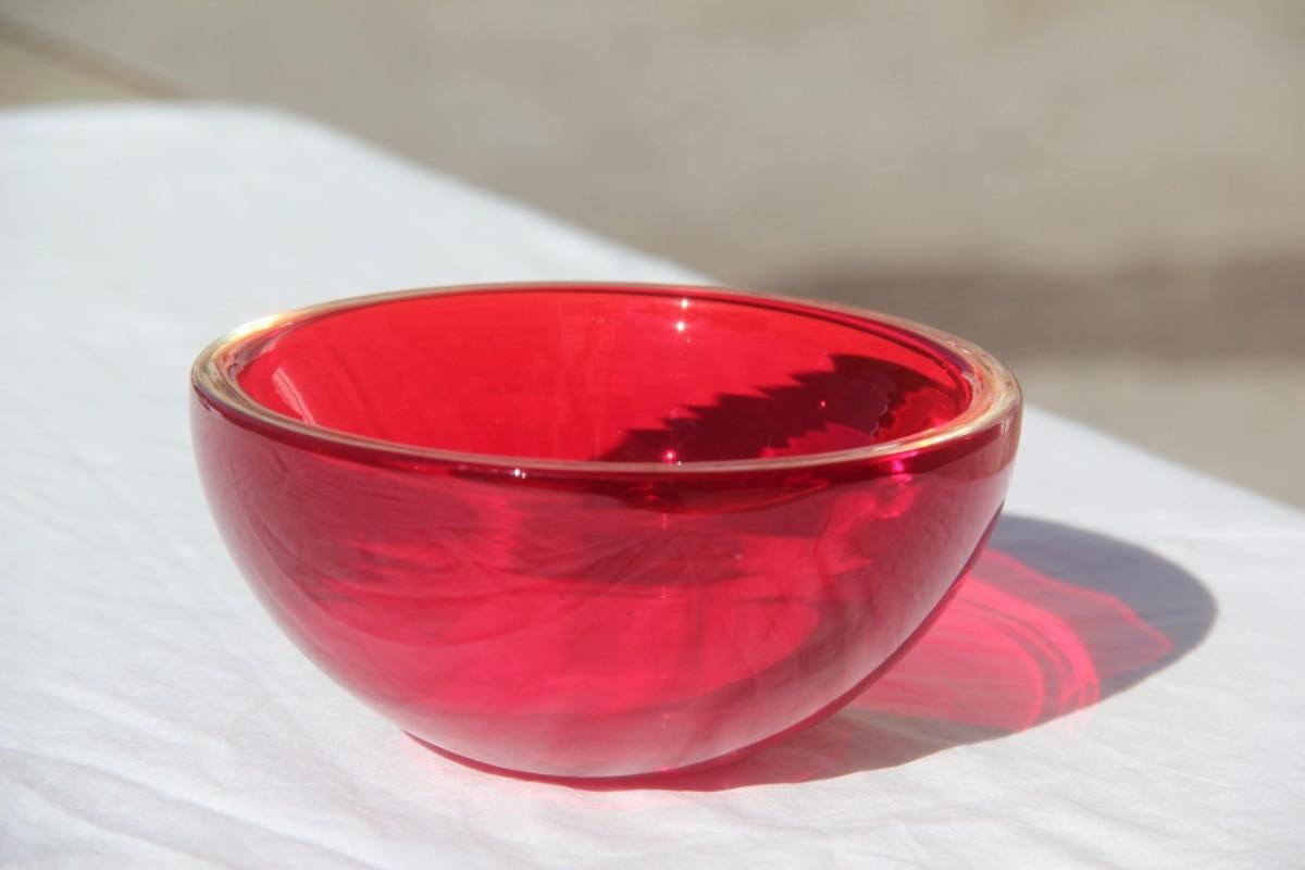 Midcentury glass bowl of Murano glass ruby red Seguso 1960 Italian design.
