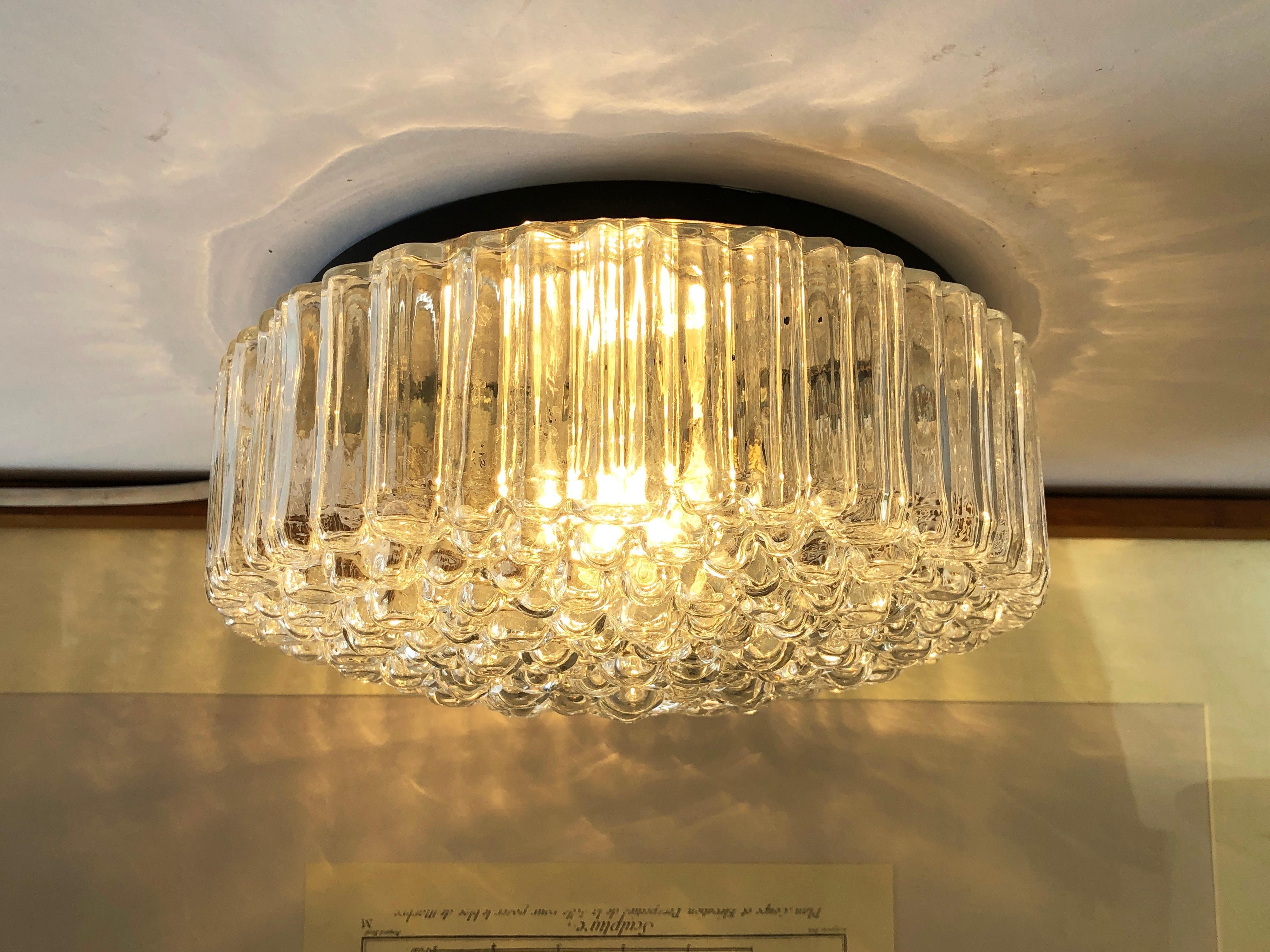 Magnificent, flush base ceiling lamp by 'Glashütte Limburg', Germans famous mid century manufacturer of high-end design lighting.
Helena Tynell is one of the artists who created the most beautiful lighting of that time.
Comes in a round shape: shade